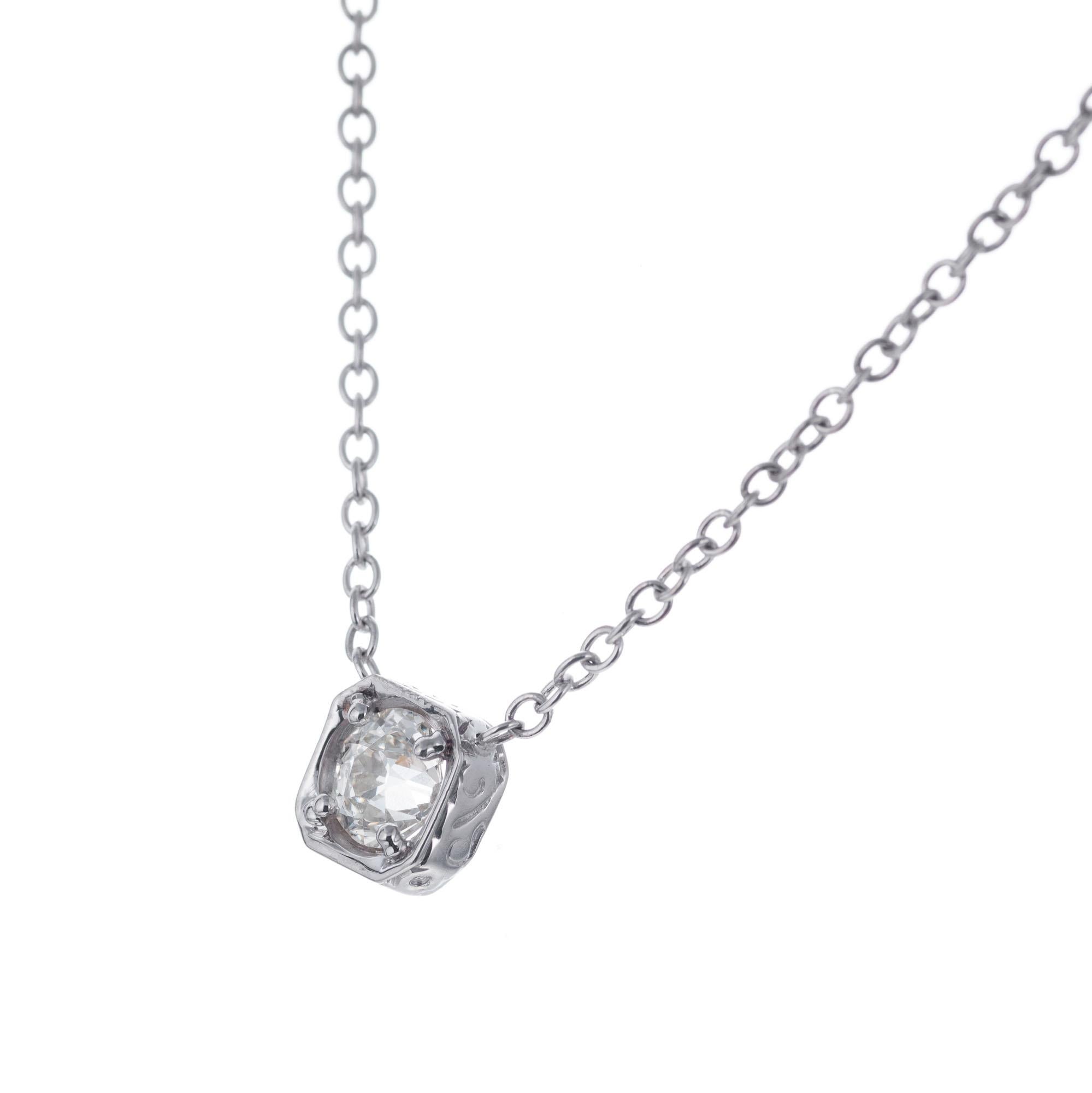 Old mine cut diamond, set in a eight sided 18k white gold setting. 18k White gold 16 inch chain.

1 old mine cut diamond, approx. .77cts
18k white gold 
3.7 grams
Chain: 16 Inches


