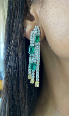 Sunita Nahata Emerald 7.70ct. Earrings in 18KWG with Diamond.