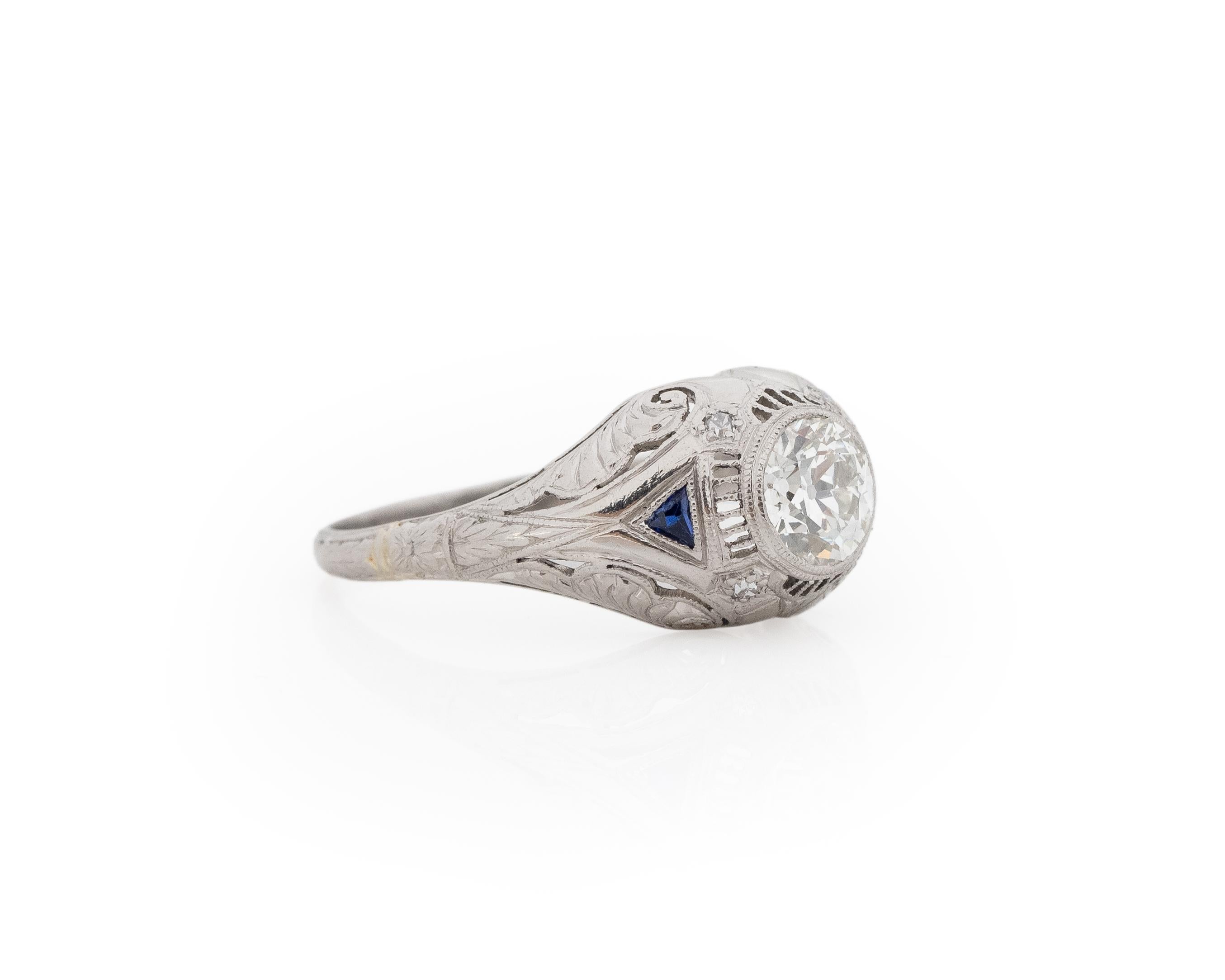 Year: 1920s

Item Details:
Ring Size: 7.75
Metal Type: Platinum [Hallmarked, and Tested]
Weight: 3.8 grams

Center Diamond Details:
Weight: .77ct total weight
Cut: Old European brilliant
Color: J
Clarity: SI1
Type: Natural

Finger to Top of Stone