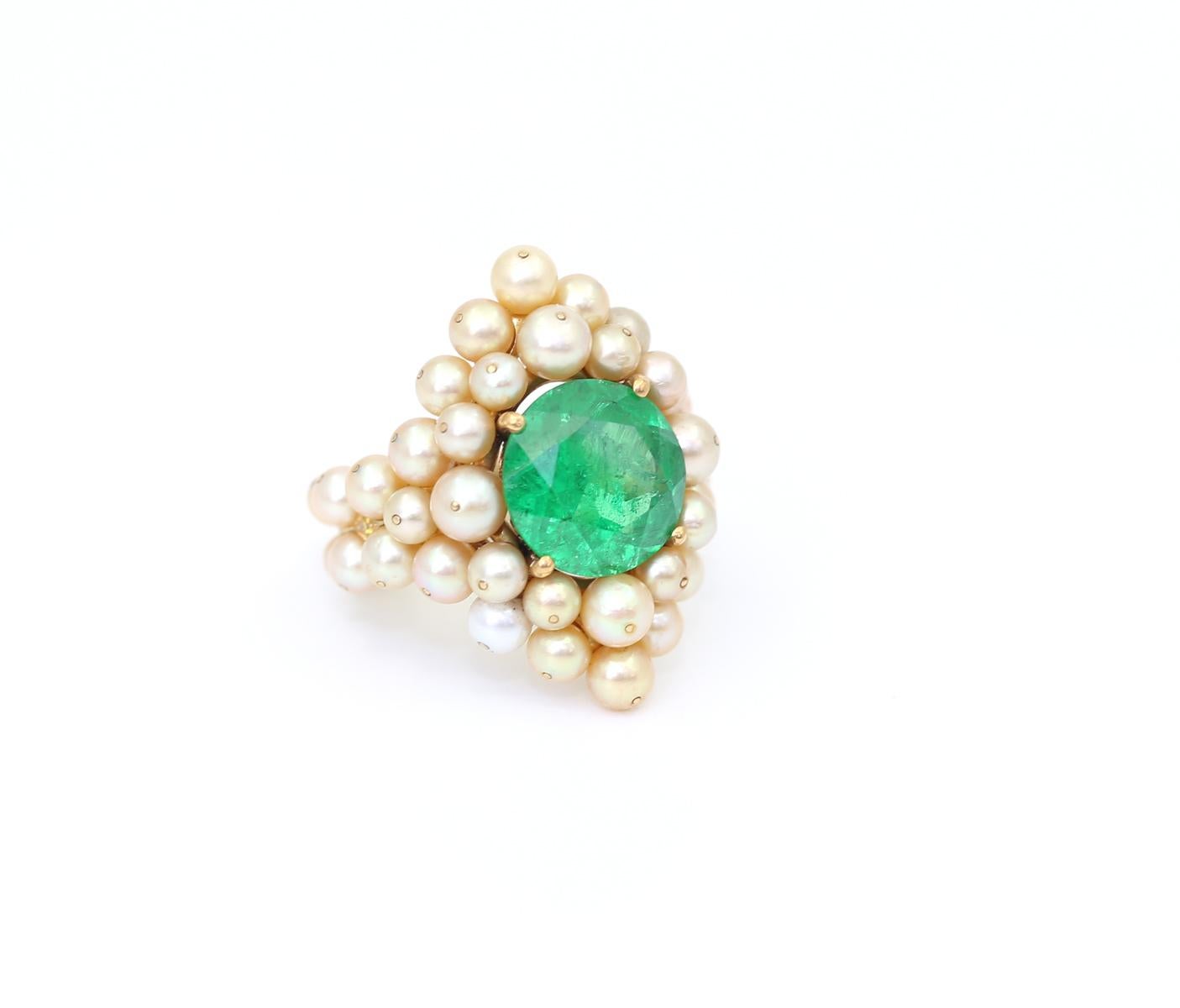 Absolutely unique Perls, Diamonds, and Demantoid Garnet ring. By  Antonio Seijo. The amount of work that was invested in this ring is just staggering, the fine fancy yellow Diamonds were installed between the wonderful pearls. Even on the inside of