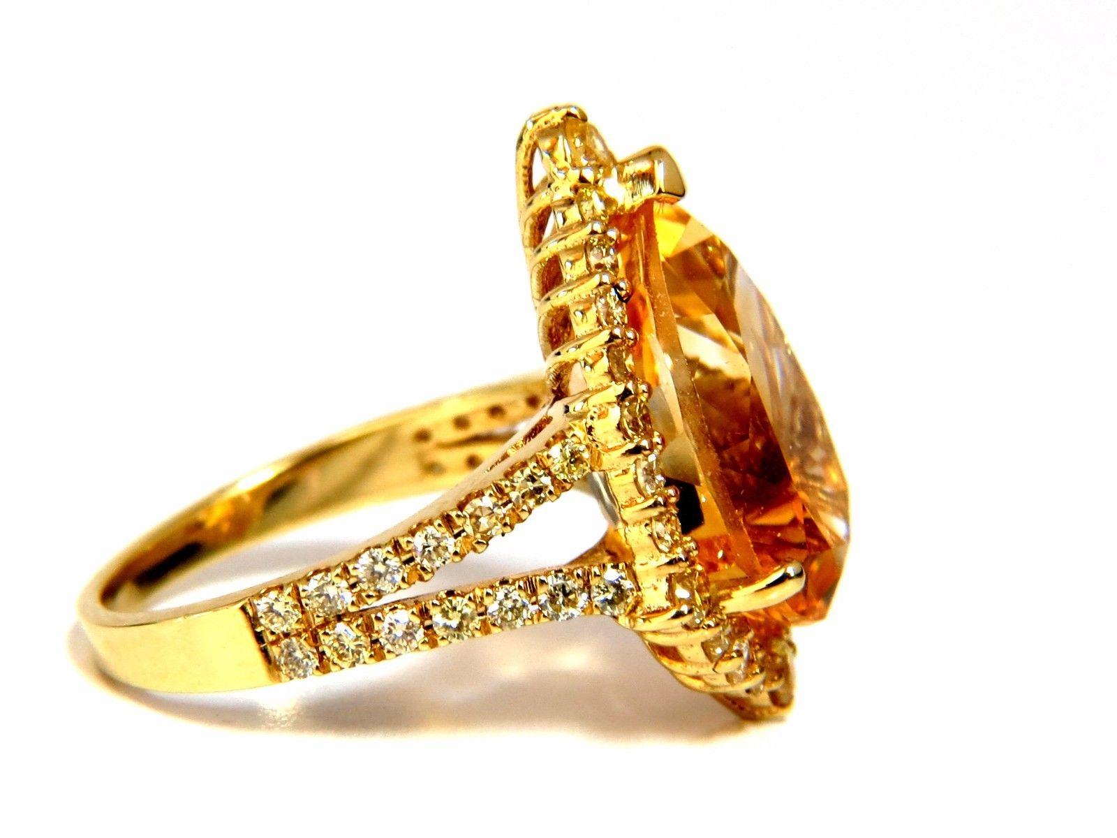 6.50ct. Natural yellow Citrine ring.

Brilliant Vivid Yellow Orange Color

Pear shaped, Brilliant

15mm X 10mm

1.20ct side natural fancy yellow diamonds

Rounds Full cuts

Vs-2 clarity.

14kt. yellow gold

4.8 grams.

Depth of ring: 7.8 mm

current
