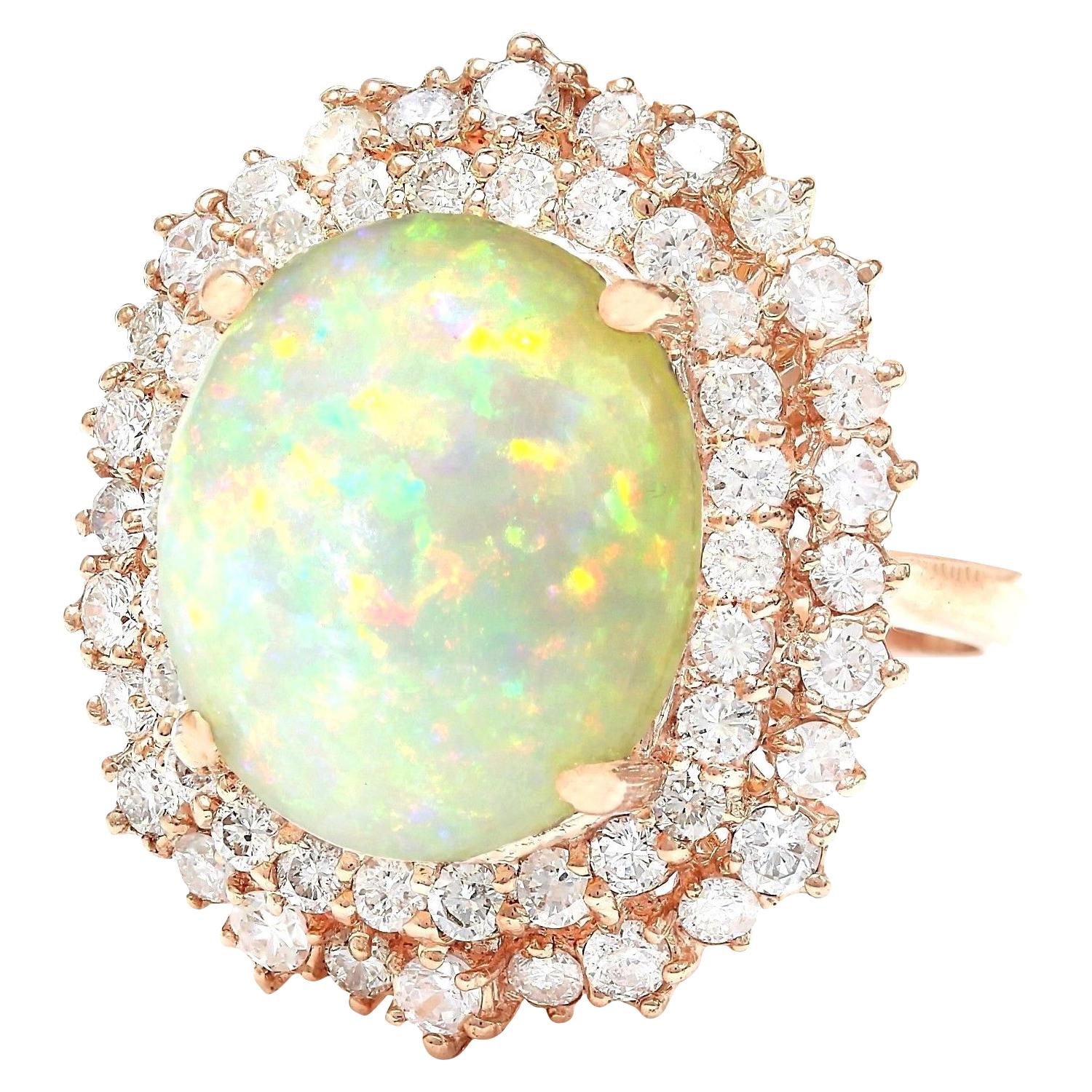 7.70 Carat Natural Opal 14K Solid Rose Gold Diamond Ring
 Item Type: Ring
 Item Style: Cocktail
 Material: 14K Rose Gold
 Mainstone: Opal
 Stone Color: Multicolor
 Stone Weight: 5.70 Carat
 Stone Shape: Oval
 Stone Quantity: 1
 Stone Dimensions: