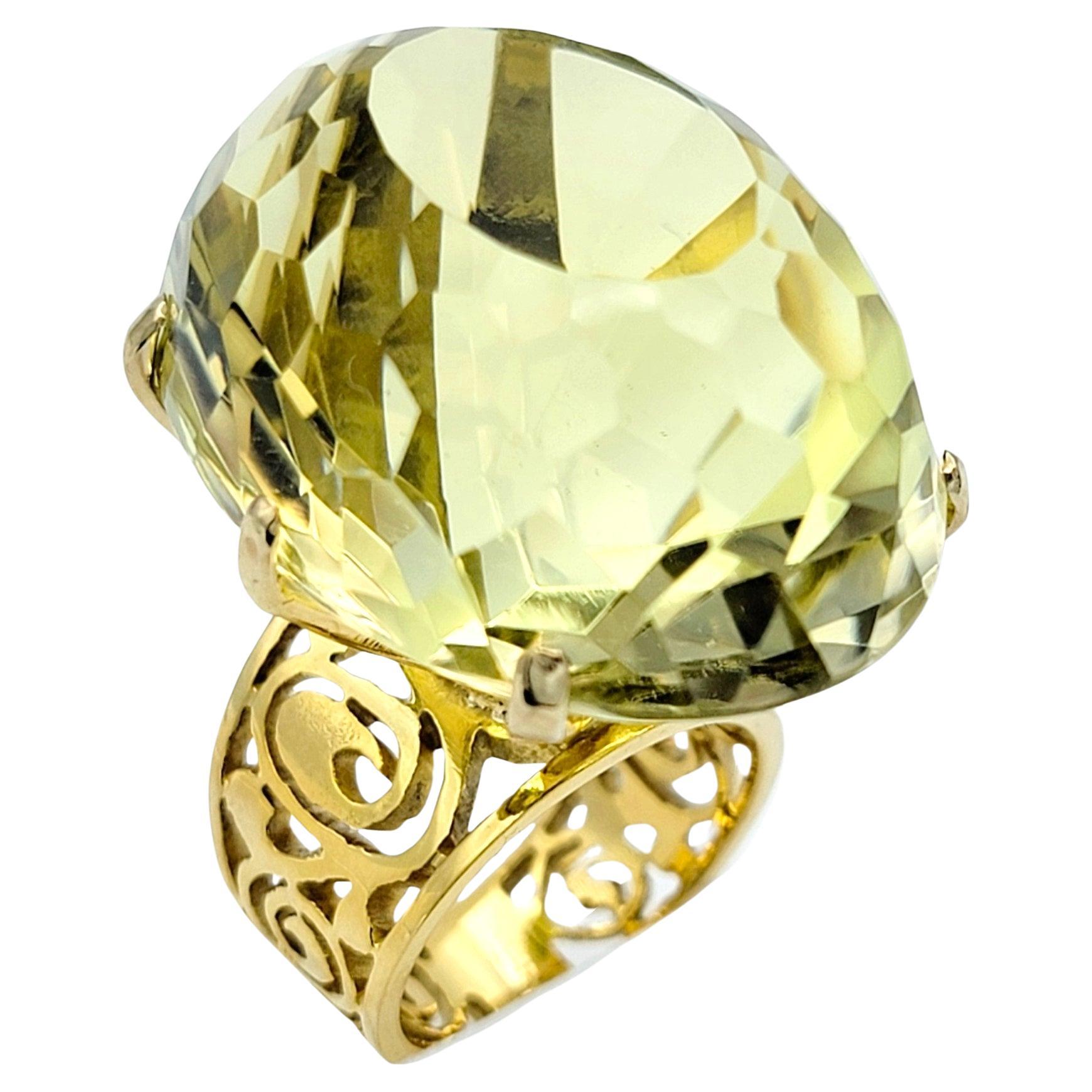 77.08 Carat Oval Citrine High Profile Cocktail Ring Set in 14 Karat Yellow Gold For Sale