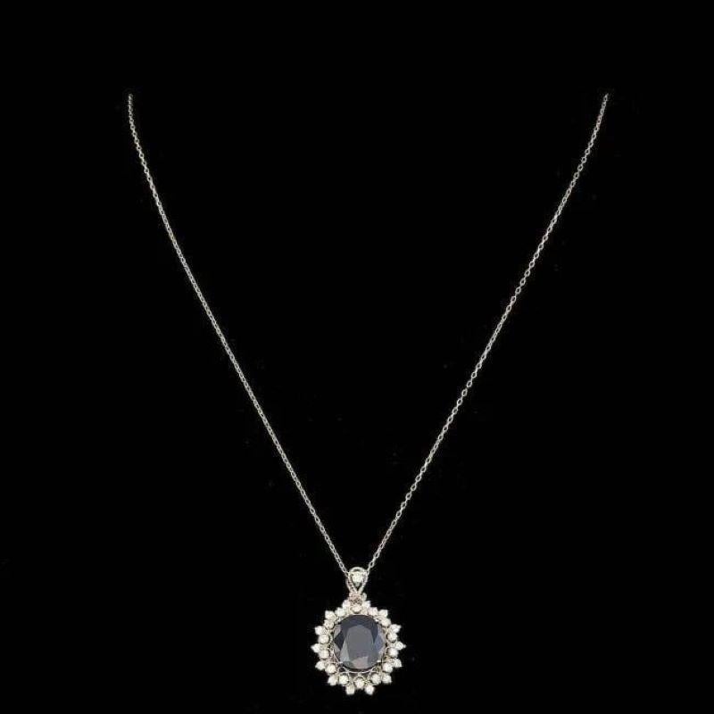 7.70Ct Natural Sapphire and Diamond 14K Solid White Gold Pendant

Natural Oval Cut Sapphire Weights: Approx. 6.90 Carats

Sapphire Measures: Approx. 12 x 10 mm

Sapphire treatment: Diffusion

Total Natural Round Diamond weights: Approx. 0.80 Carats