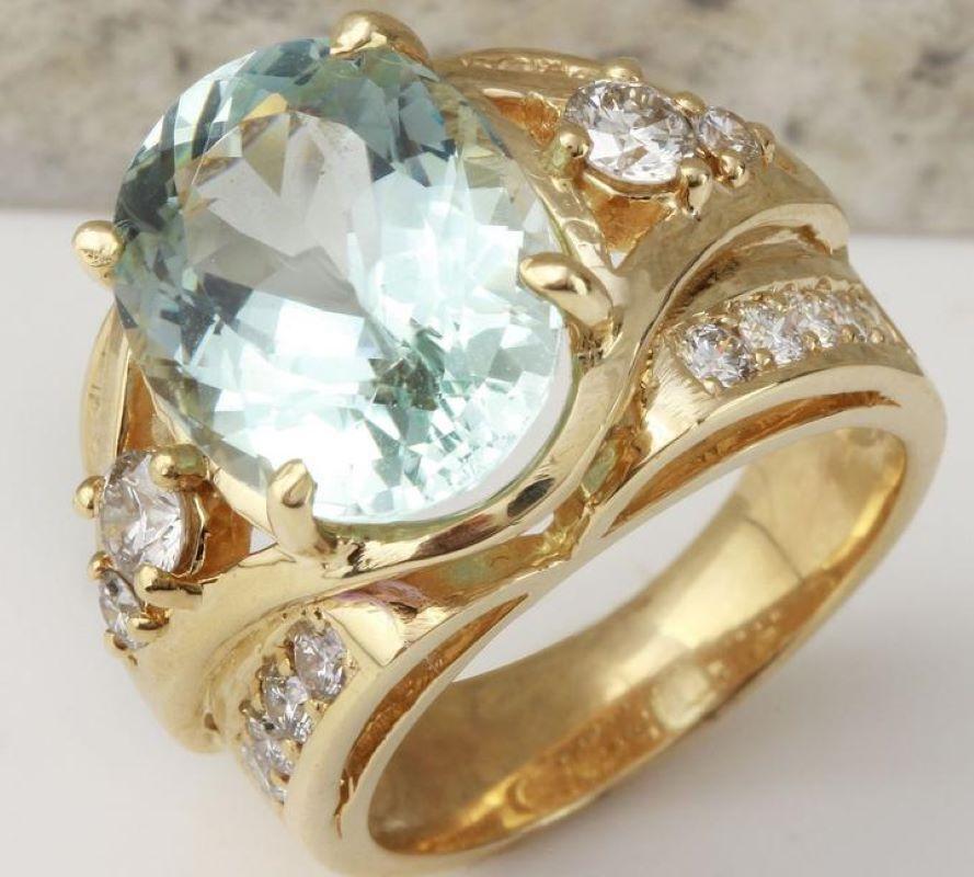 7.71 Carats Exquisite Natural Aquamarine and Diamond 14K Solid Yellow Gold Ring

Total Natural Aquamarine Weight is: Approx. 6.21 Carats

Aquamarine Measures: Approx. 14.12 x 10.80mm

Natural Round Diamonds Weight: Approx. 1.50 Carats (color G-H /