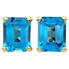 7,72 Karat Blauer Topas im Smaragdschliff Ohrstecker aus 18 Karat Gelbgold