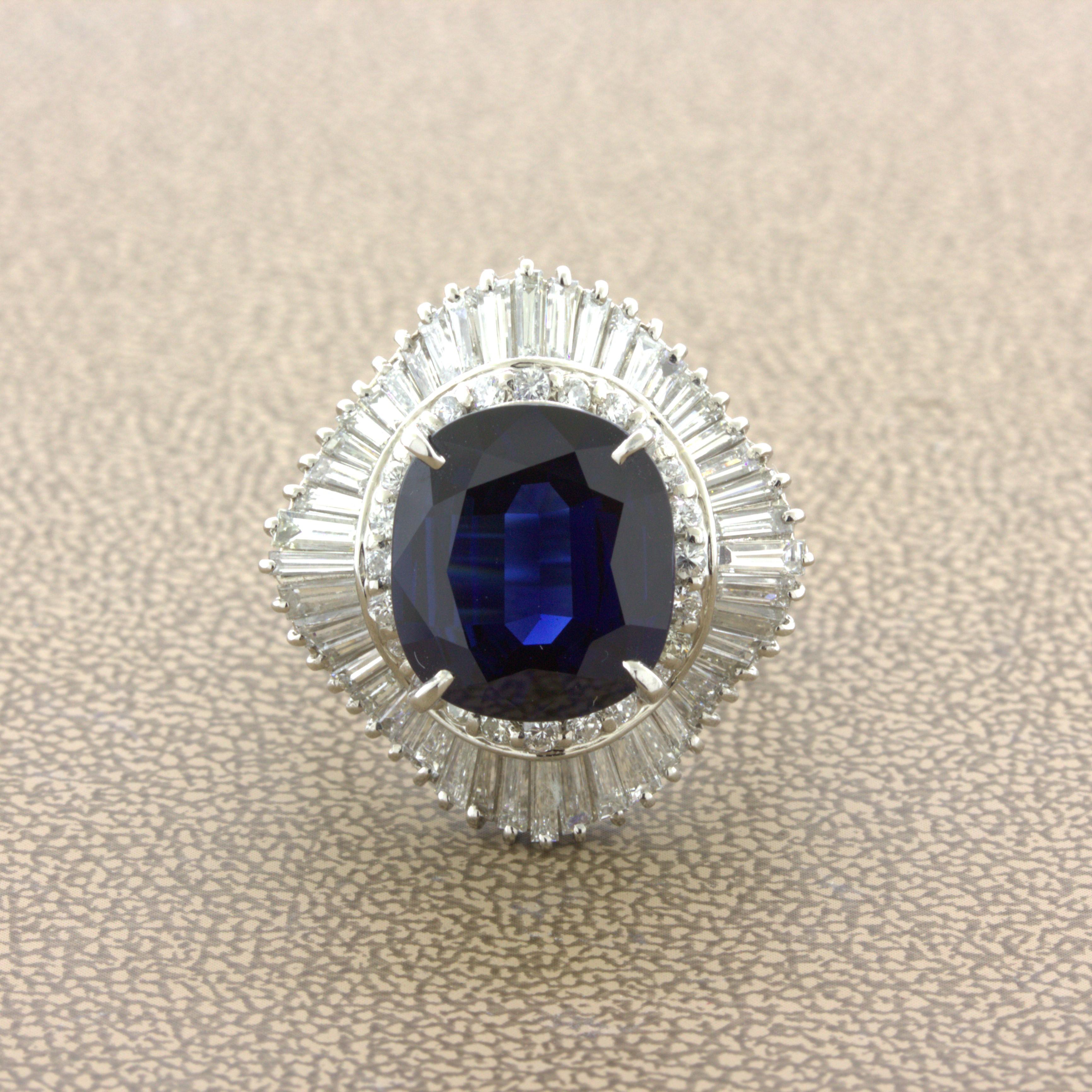A large and impressive sapphire weighing 7.73 carats takes center stage. It has a rich deep blue color and a lovely cushion shape. Adding to that, it is certified by the GIA as natural with no treatment of any kind. A rare and beautiful gem. It is