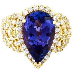 7.73 Carat Tanzanite 18 Karat Solid Yellow Gold Diamond Ring