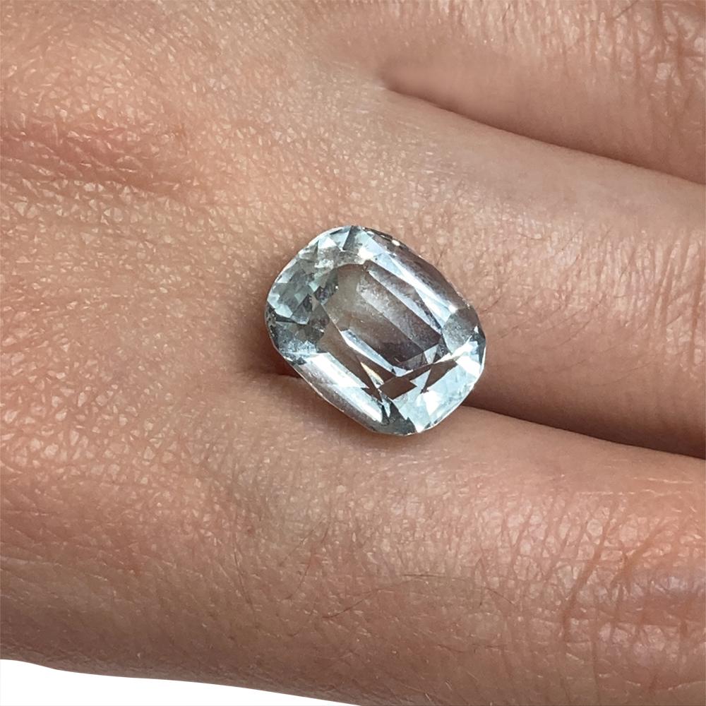 Description:

Gem Type: Aquamarine 
Number of Stones: 1
Weight: 7.73 cts
Measurements: 13.17 x 10.77 x 8.40 mm
Shape: Cushion
Cutting Style Crown: Brilliant Cut
Cutting Style Pavilion: Step Cut 
Transparency: None
Clarity: Very Very Slightly