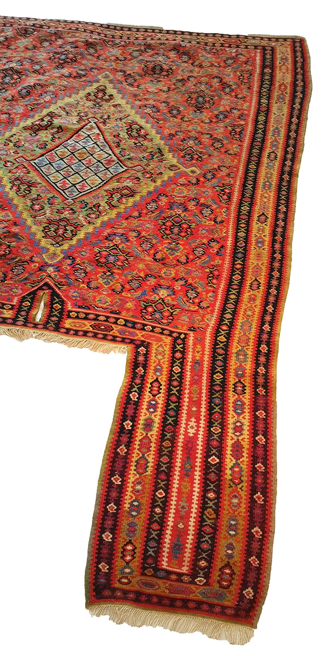 774 - Nice fine Kilim and horse saddle. End of 19th century with beautiful patterns and beautiful colors orange, green and dark blue, completely hand-woven with wool woven on cotton foundation.