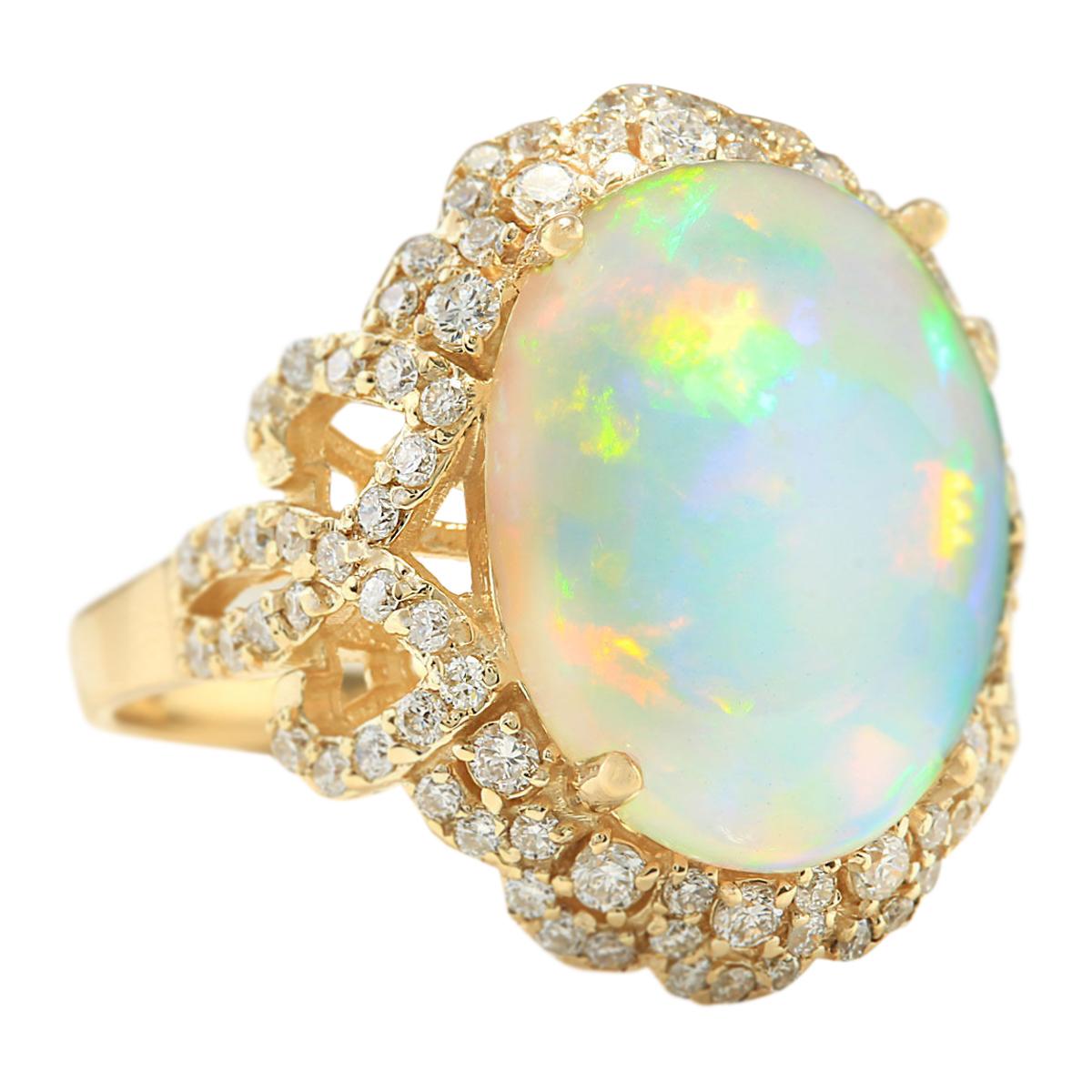 7.75 Carat Natural Opal 14 Karat Yellow Gold Diamond Ring
Stamped: 14K Yellow Gold
Total Ring Weight: 7.0 Grams
Total Natural Opal Weight is 6.65 Carat (Measures: 16.00x12.00 mm)
Color: Multicolor
Total Natural Diamond Weight is 1.10 Carat
Color: