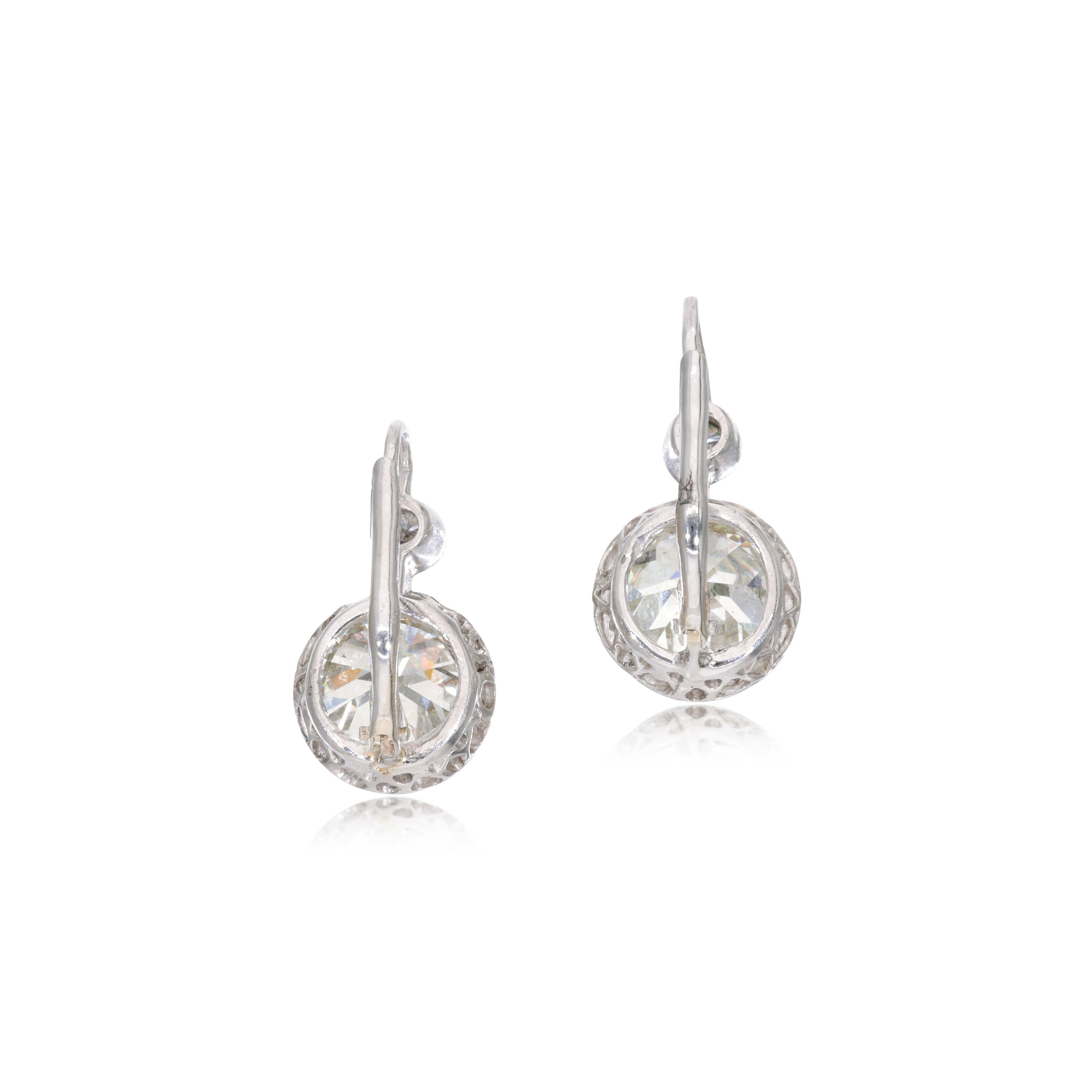 7.75 Carat Old European Cut M VS1 Diamond 14 Karat White Gold Leverback Earrings In Good Condition For Sale In New York, NY