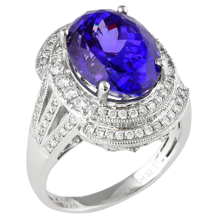 7.75 Carat Oval Shaped Tanzanite Ring in 18 Karat White Gold with Diamonds For Sale