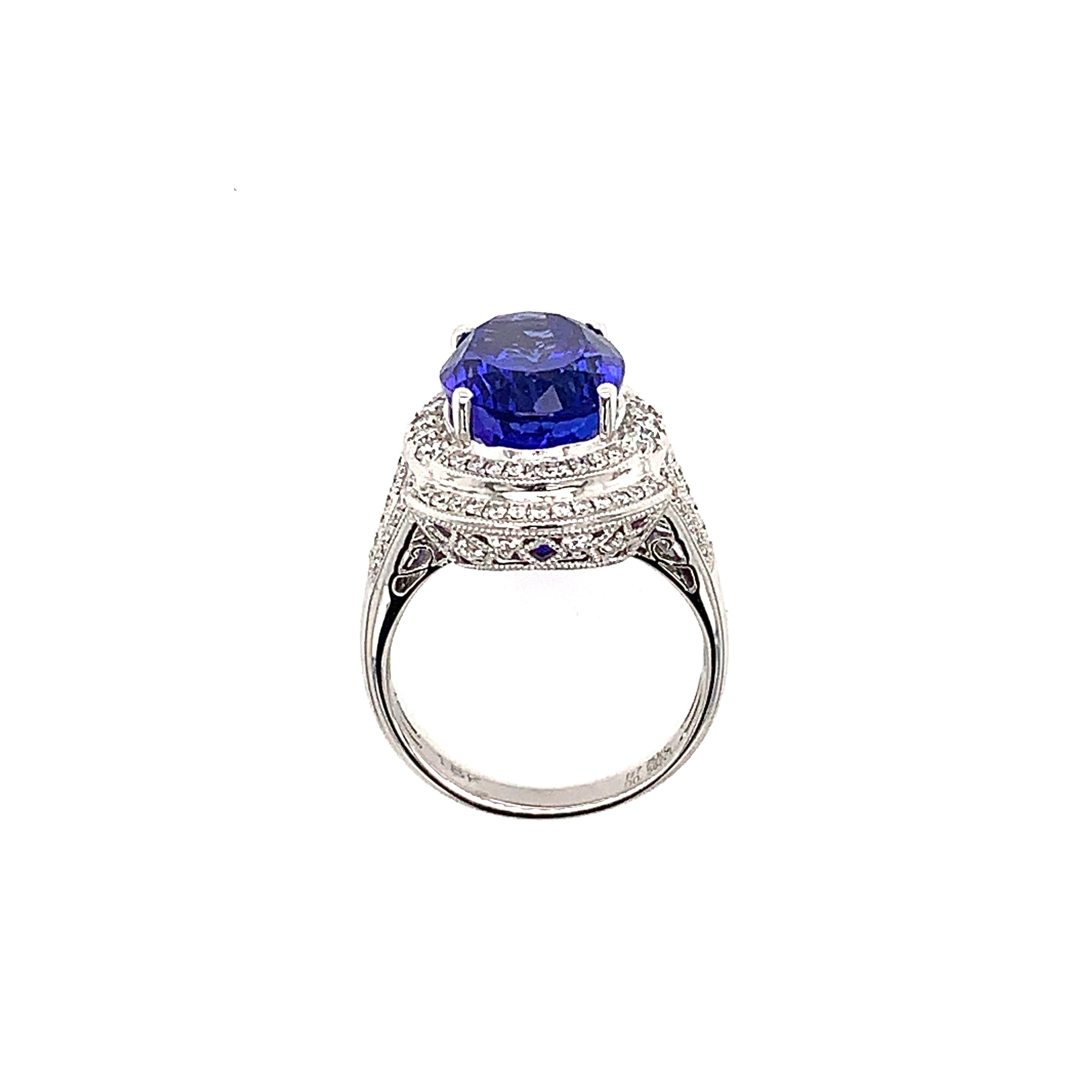 Classic tanzanite ring in 18K white gold with diamonds. 

Tanzanite: 7.753 carat oval shape.
Diamonds: 0.560 carat, G colour, VS clarity. 
Gold: 7.097g, 18K white gold. 