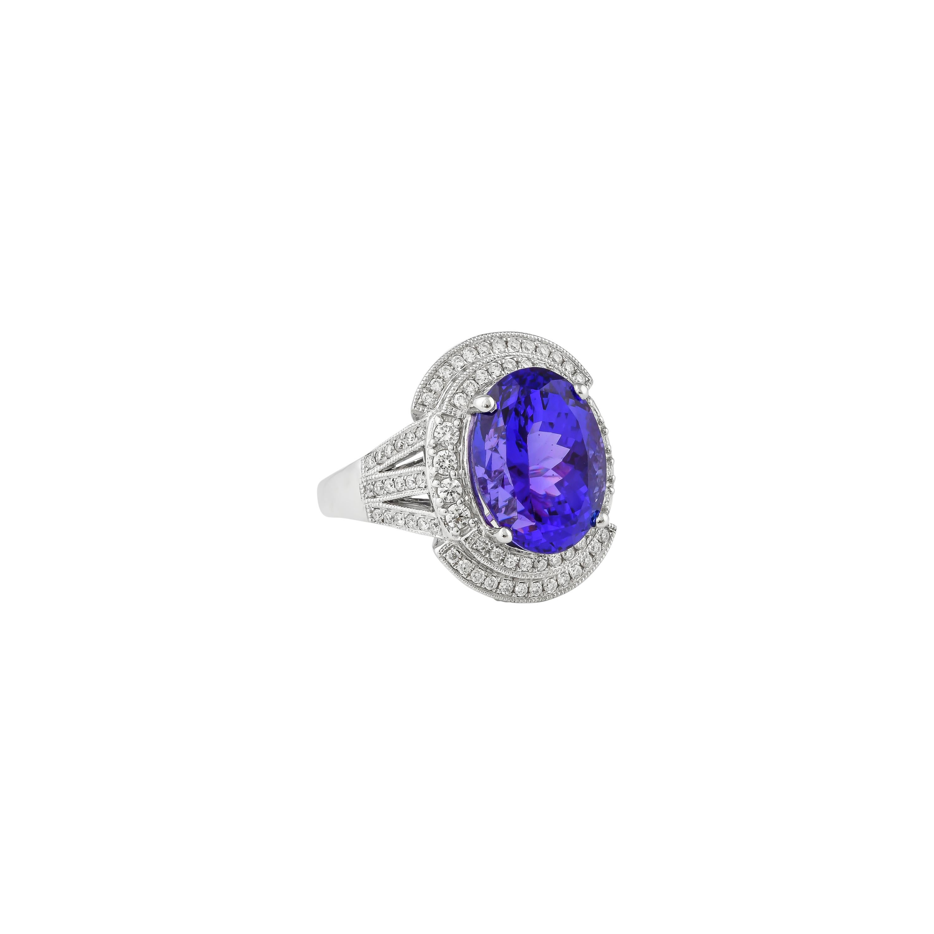 Oval Cut 7.75 Carat Oval Shaped Tanzanite Ring in 18 Karat White Gold with Diamonds For Sale
