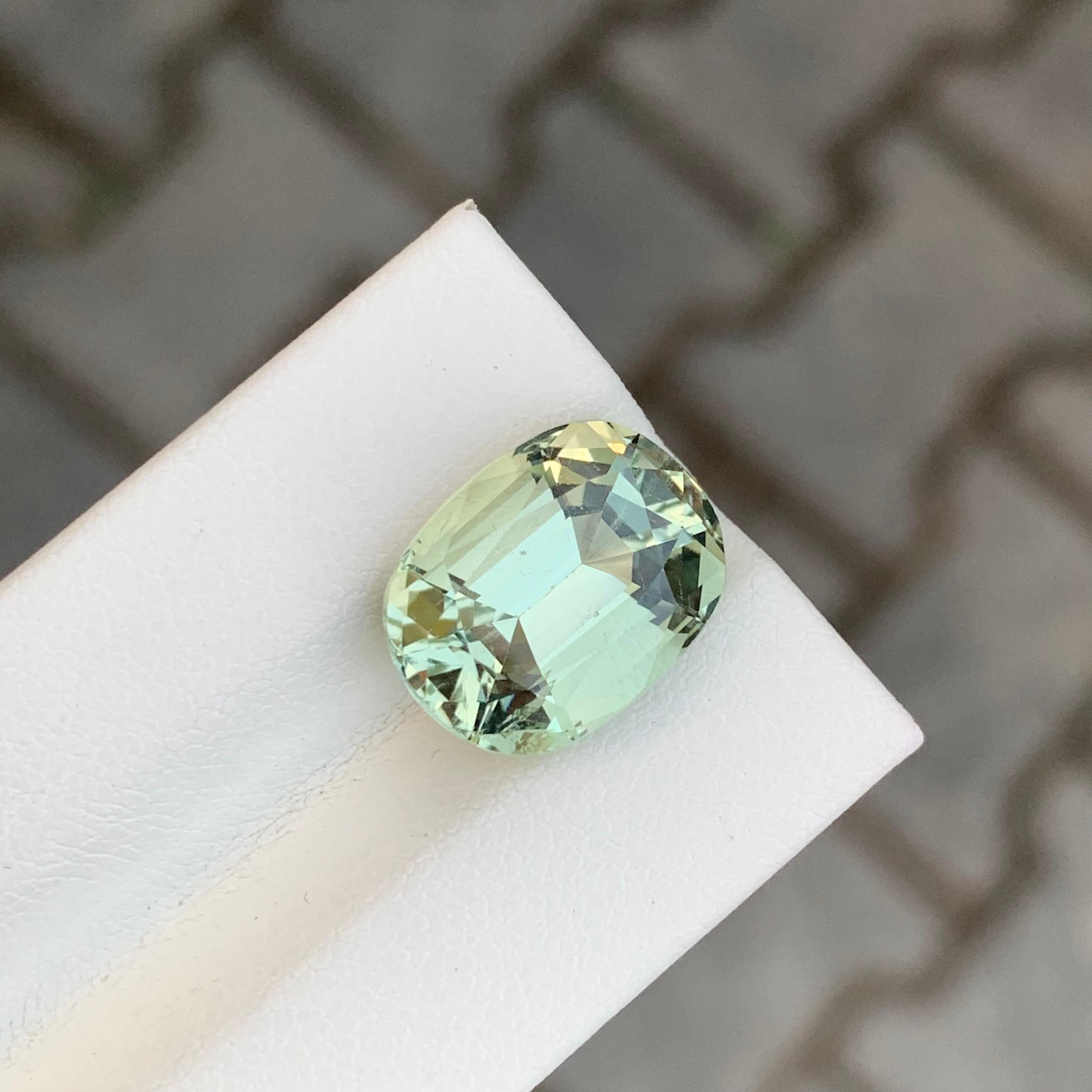 Loose Heliodor
Weight: 7.75 Carat
Dimension: 14.2 x 11 x 8.2 Mm
Origin: Pakistan
Shape: Cushion 
Certificate: On Demand

Heliodor, a captivating member of the beryl mineral family, is renowned for its radiant golden to yellow hues. The name
