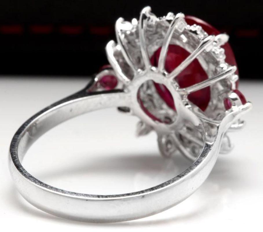 7.75 Carats Impressive Red Ruby and Diamond 14K White Gold Ring

Suggested Replacement Value $4,900.00

Total Red Ruby Weight is: 7.00 Carats (lead glass filled)

Ruby Measures: 12 x 10mm 

Natural Round Diamonds Weight: .75 Carats (color G-H /