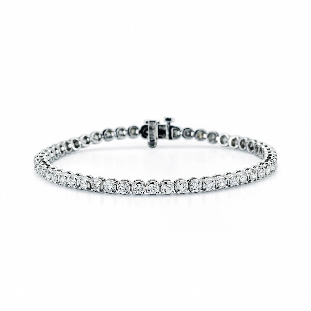 7.12 Carat Diamond Line Tennis Bracelet, in 18K white gold, by The Diamond Oak
With 38 perfectly matched ( .20cts , 3.8mm each) round brilliant diamonds , with exceptional I color and SI1 clarity.  
Bracelet is  exceptional craftsmanship.
Total