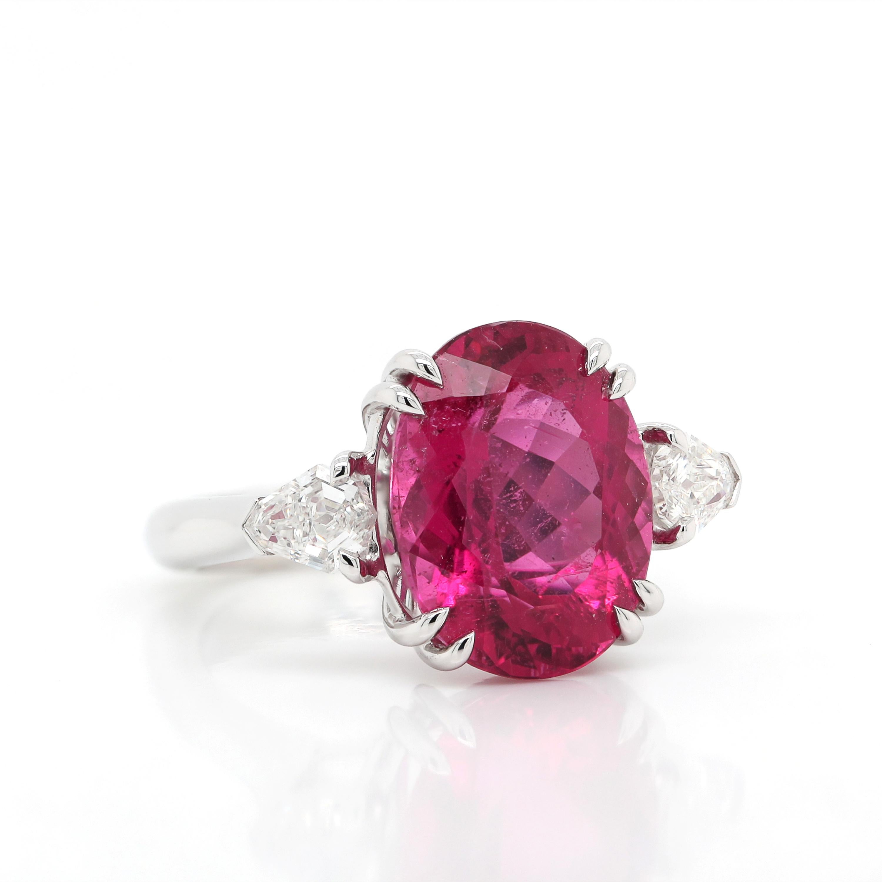 Stunning ring with a vivid Rubellite. Sitting low in the setting, this tourmaline is a rich, pure red color. Would make a great July birthstone, Ruby substitute! 
-Rubelite 7.76 carat
-Diamond 0.70 carat
-18K White Gold 9.67 gram
-Ring Size 52