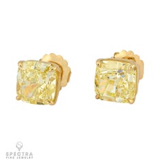 7.77 & 7.92 ct. Fancy Yellow Cushion Diamond Stud Earrings in 18k Gold  Spectra