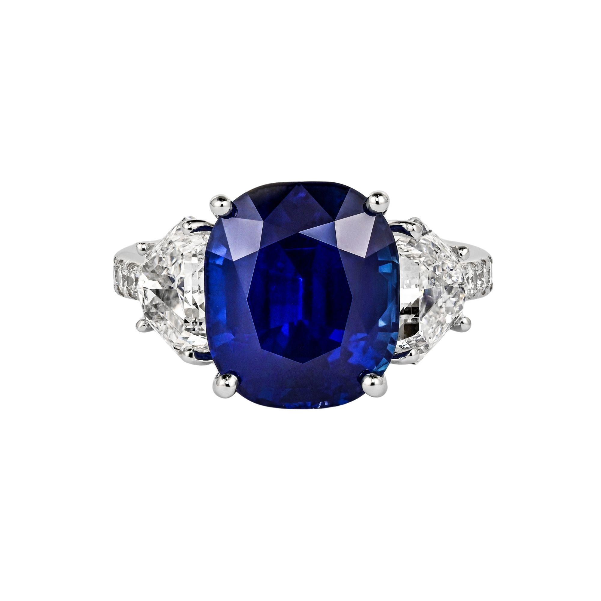 This natural 7.77 carat unheated Ceylon blue sapphire ring is a striking statement of elegance and rarity. It is both AGL Certified and SSEF certified as originating from Ceylon (Sri Lanka) and having no heat or clarity treatment of any kind. Set in