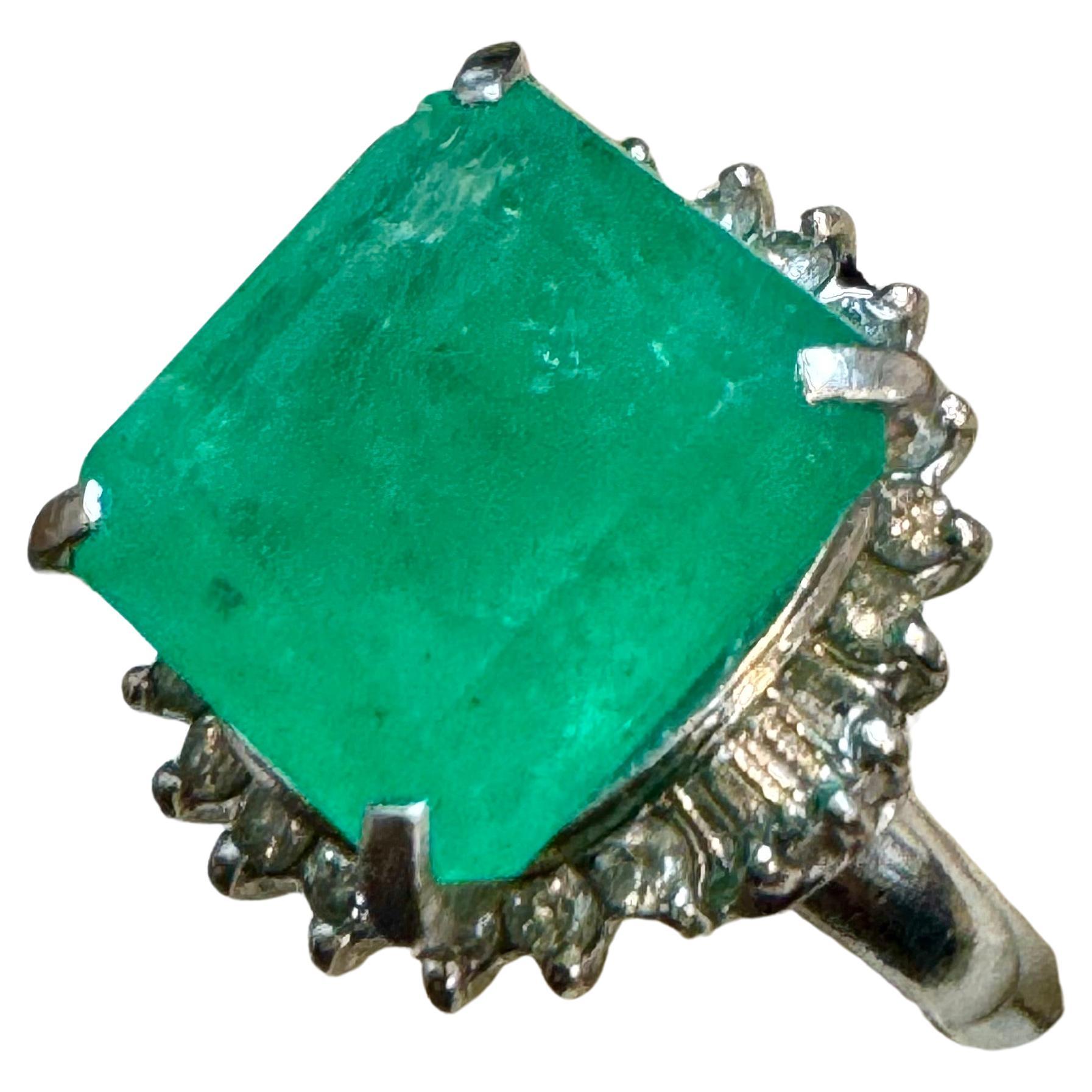 7.78 Carat Natural Square  Emerald & 0.45 Ct  Diamond Ring In Platinum Size 4.5

Emerald Measurements 12X12MM
 7.78 Carat Natural Cushion / Square Emerald & Diamond Ring  in Platinum
Intense green color, Beautiful stone with shine and luster  but
