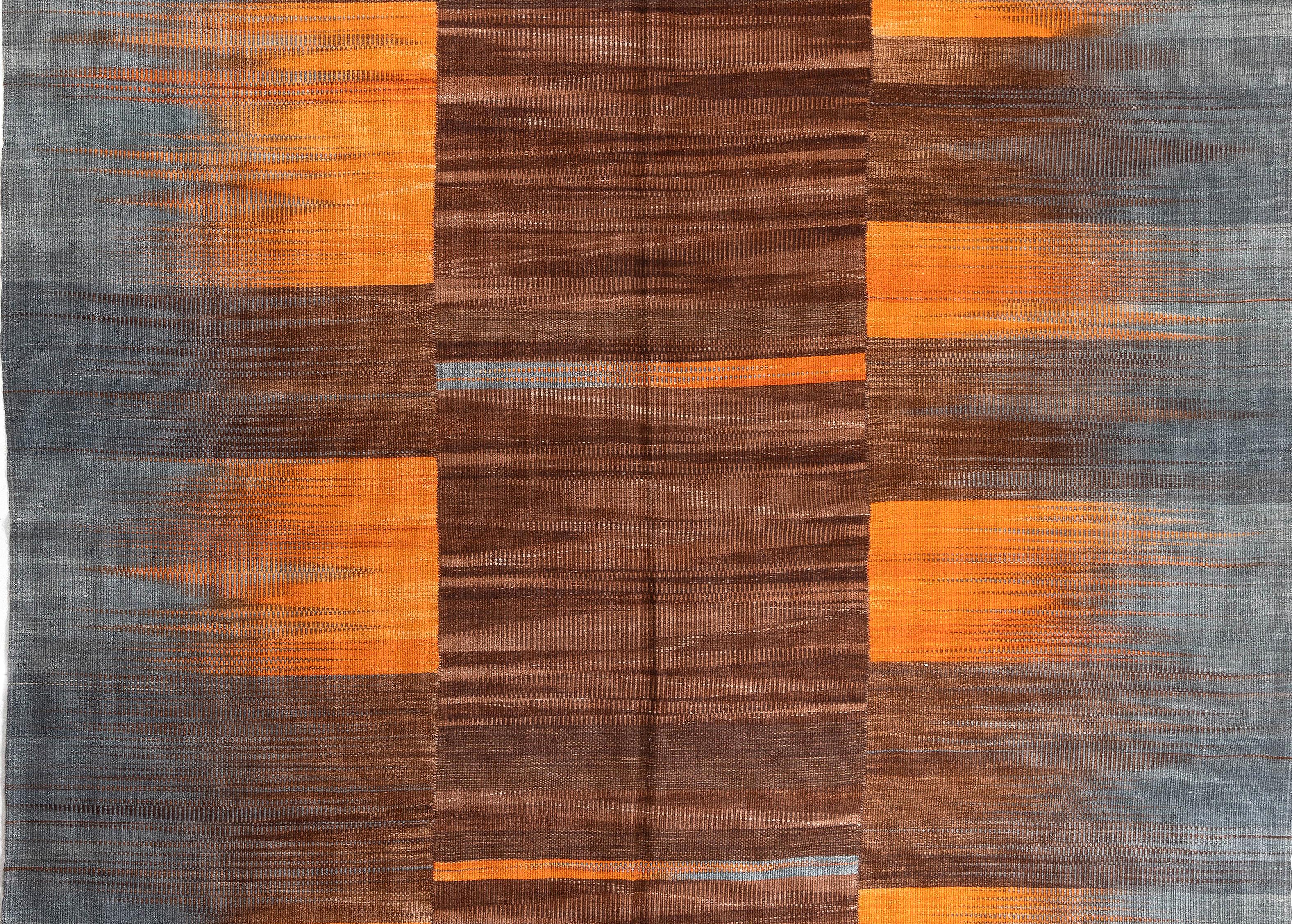 A modern flat-weave rug with minimal design. Handwoven by female artisans in a rural village workshop in Eastern Turkey under the supervision and with the support of Ministry of Education and Ministry of Culture and Tourism of Turkey.
Wool wefts on