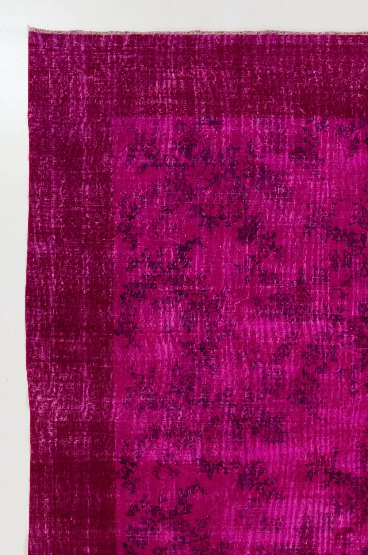 A vintage Turkish area rug re-dyed in fuchsia pink color for contemporary interiors. Measures: 7.7 x 11.7 Ft.
Finely hand knotted, low wool pile on cotton foundation. Professionally washed.
Sturdy and can be used on a high traffic area, suitable