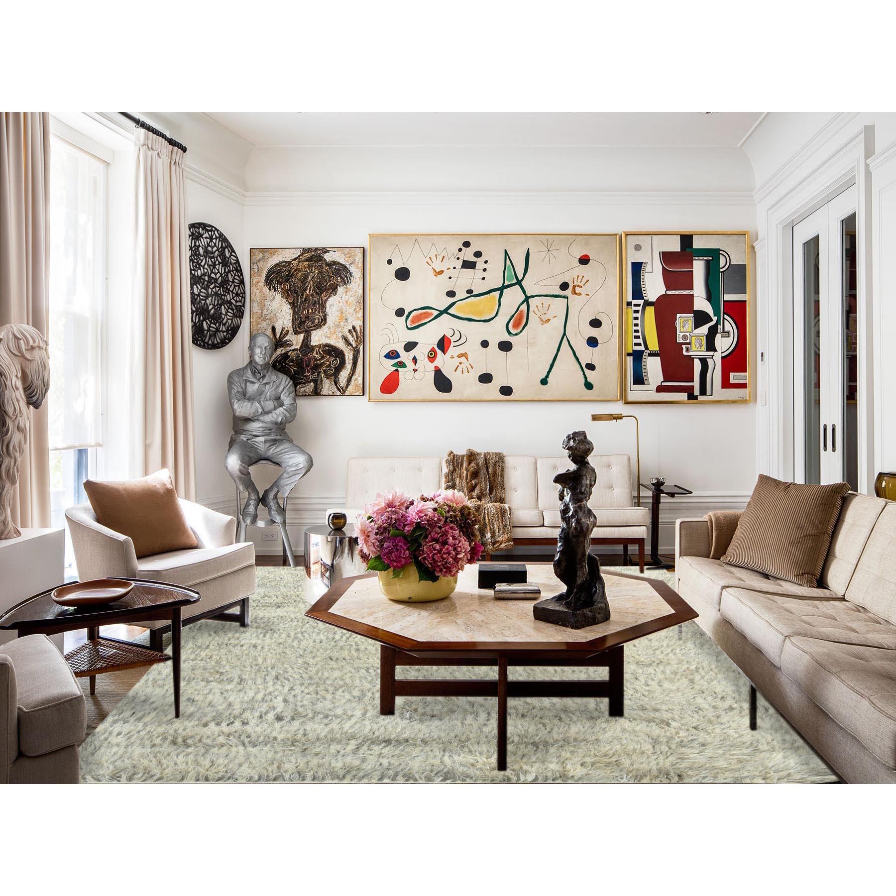 This is a truly genuine one-of-a-kind Gray, Undyed Natural Wool Hand Knotted, Shag Flokati Greek Style, Oriental Rug. It has been Knotted for months and months in the centuries-old weaving craftsmanship techniques by expert artisans.
Primary