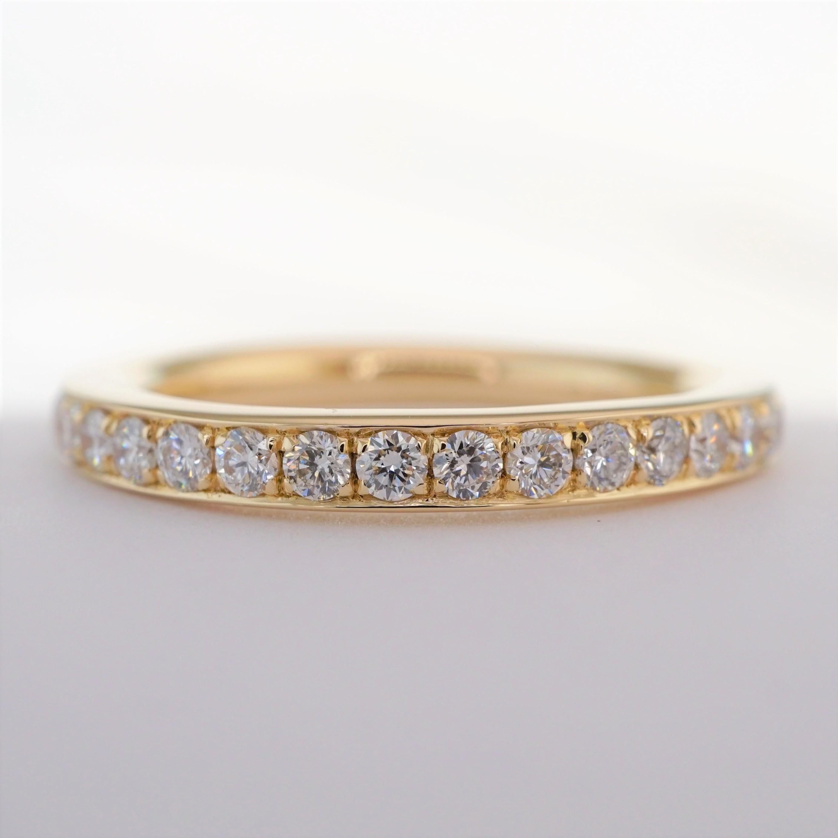 Diamond Eternity Band set in 18K Yellow gold. Pave set brilliant round diamonds are F-G VS2. Carat weight: .78 ct. Total ring weight: 3.30 grams. Ring size: 5.5. Can be sized upon request. This ring is customizable, price may vary depending on