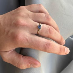 .78 carat bezel set indigo/purple sapphire and 14k yellow gold ring by G&GS