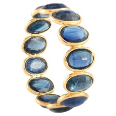 7,8 Karat kontinuierlicher ovaler blauer Saphir Eternity-Ring aus 18 Karat Gelbgold
