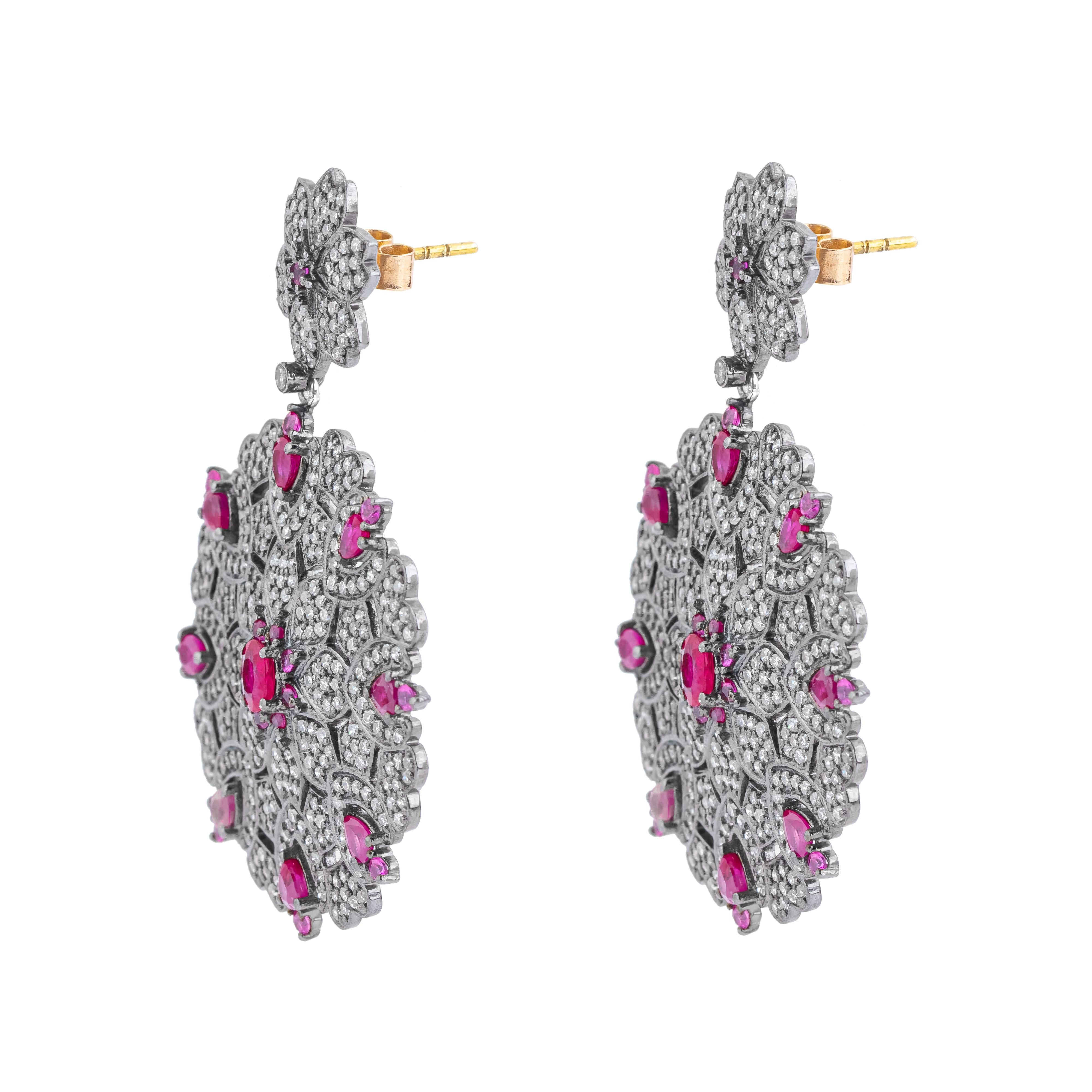 Immerse yourself in the luxurious world of our 7.8 Carat Diamond and Ruby Cocktail Earrings, where craftsmanship meets sophistication in every facet. Each pair is a testament to meticulous design and curated elegance, blending the allure of diamonds