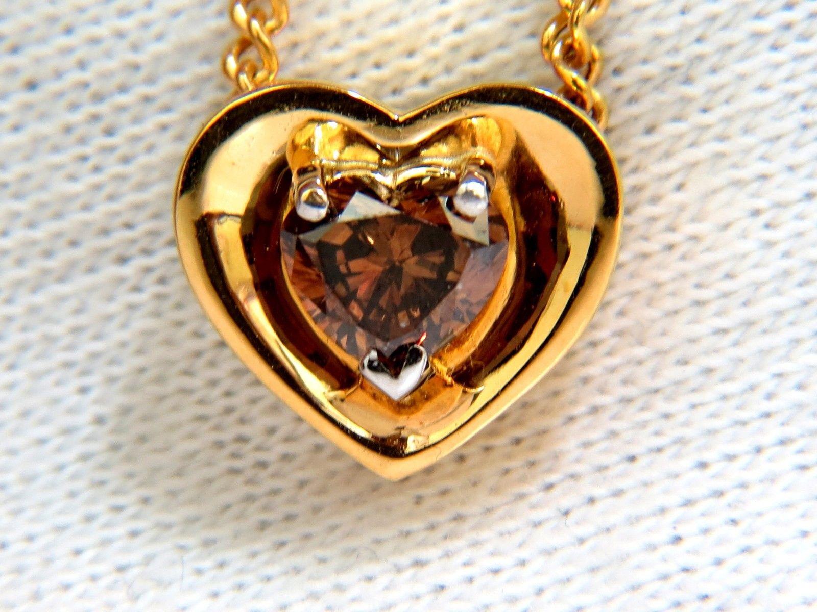 .78CT Natural Bright Pure Natural Fancy Brown Heart cut diamond pendant.

Vs-2 Clean Clarity, Fully transparent.

Full cut, amazing sparkles

14Kt Yellow Gold

& Necklace included

Grand Weight: 5.2 Grams

Appraisal to accompany @ $6,500