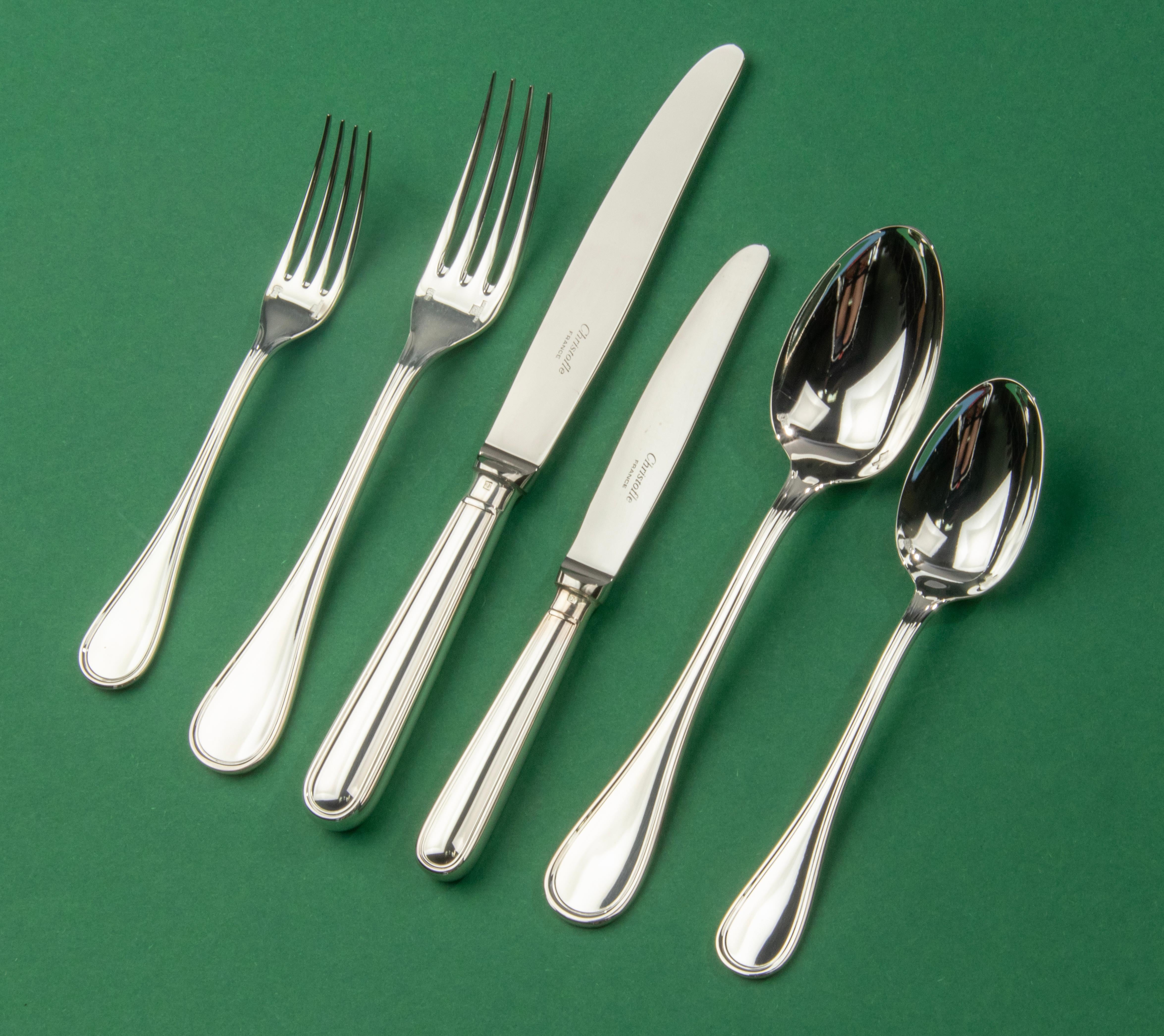 A beautiful silver plated set of tableware for 12 persons, made by the French brand Christofle, from the series Albi. This set is in new condition, all pieces are packed and sealed in original Christofle blisters. Only a few pieces were unpacked for
