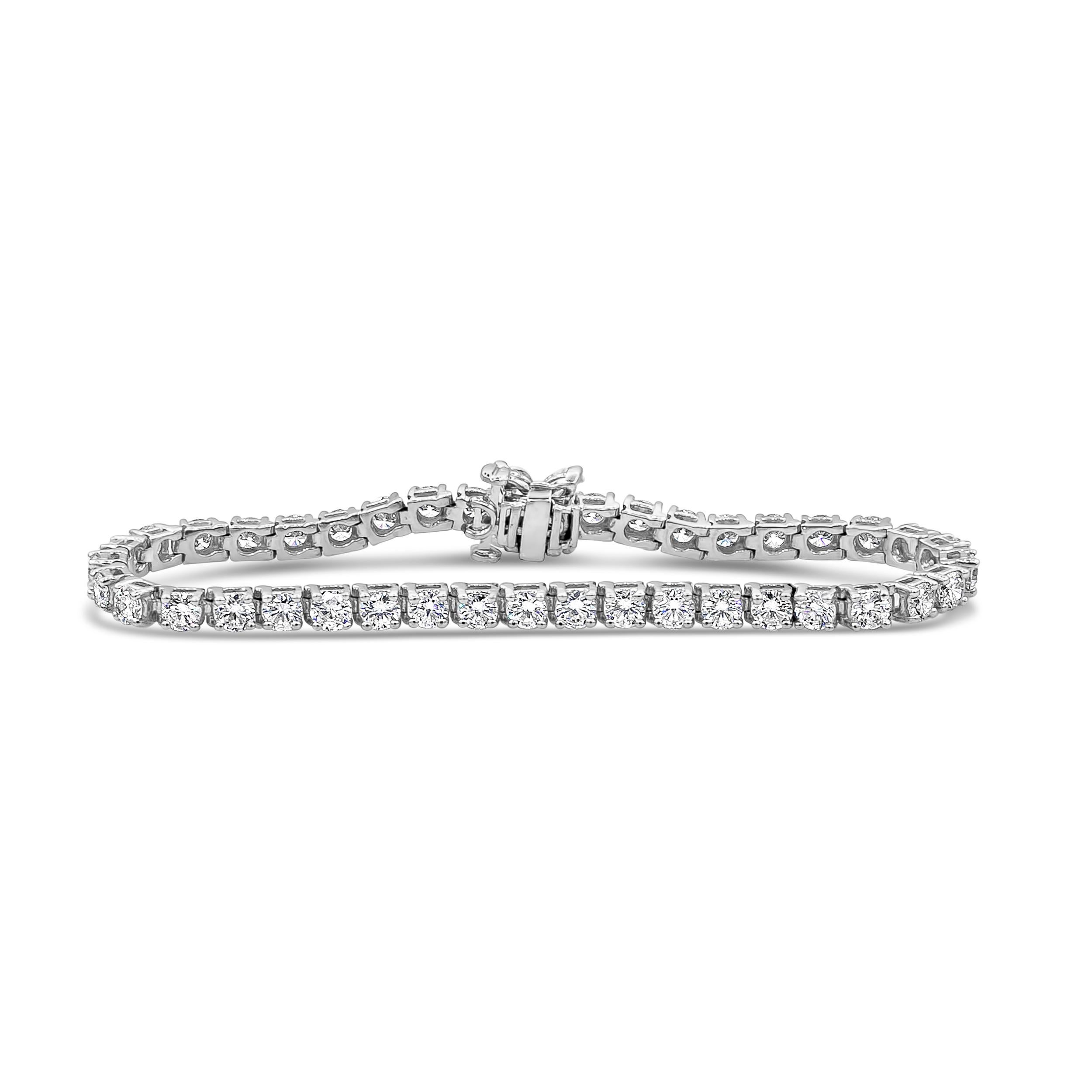 A classy and simple tennis bracelet showcasing a row of 39 pieces of round brilliant diamonds weighing 7.80 carats total, F-G color, VS-SI in clarity. Finished with a flower-motif design made of 4 pieces of marquise cut diamonds on the clasp