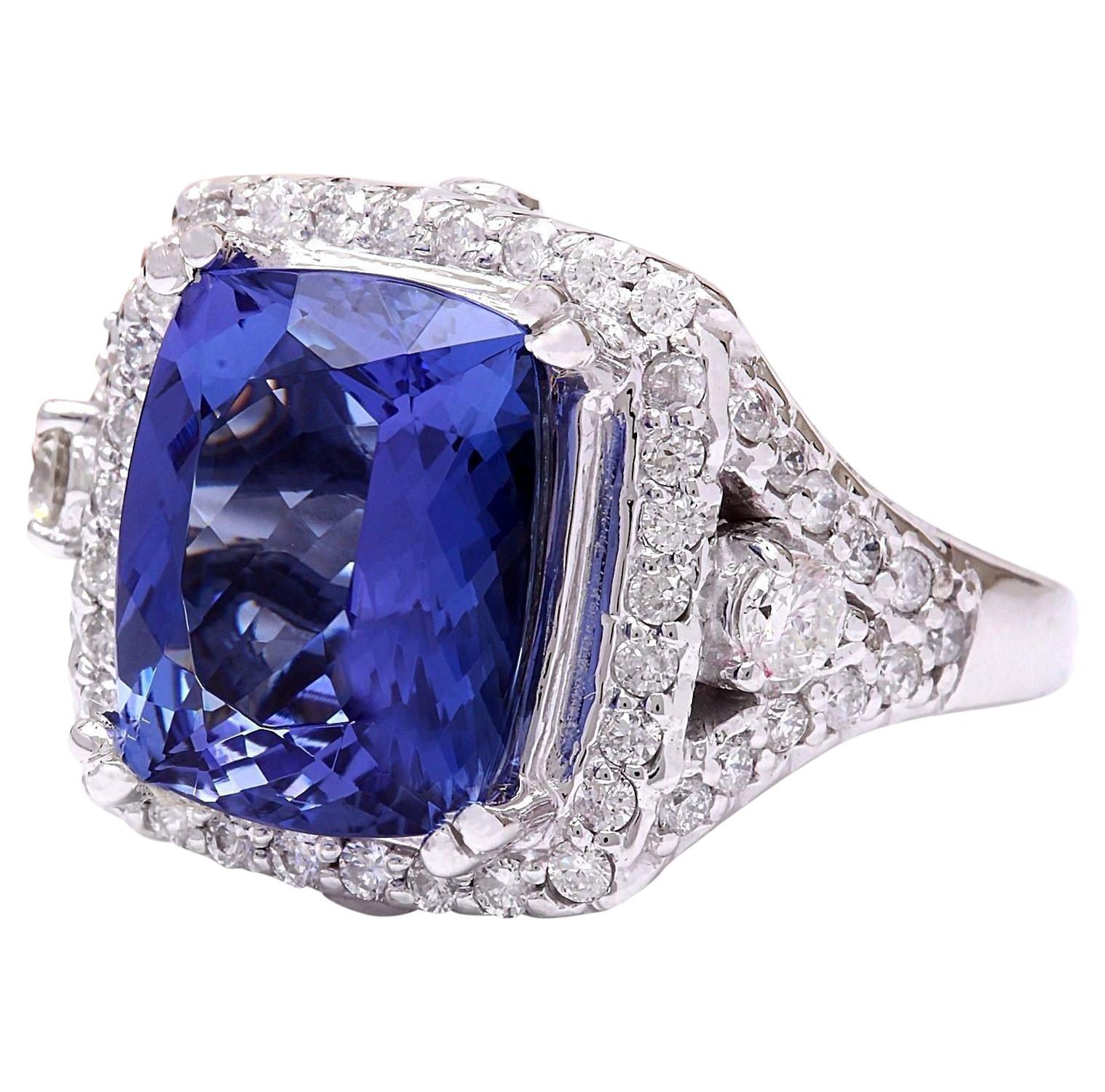 Introducing our stunning 7.80 Carat Tanzanite 14K Solid White Gold Diamond Ring. Crafted from luxurious 14K White Gold, this ring features a captivating cushion-cut Tanzanite weighing 6.80 carats, with dimensions of 12.00x10.00 mm, showcasing its
