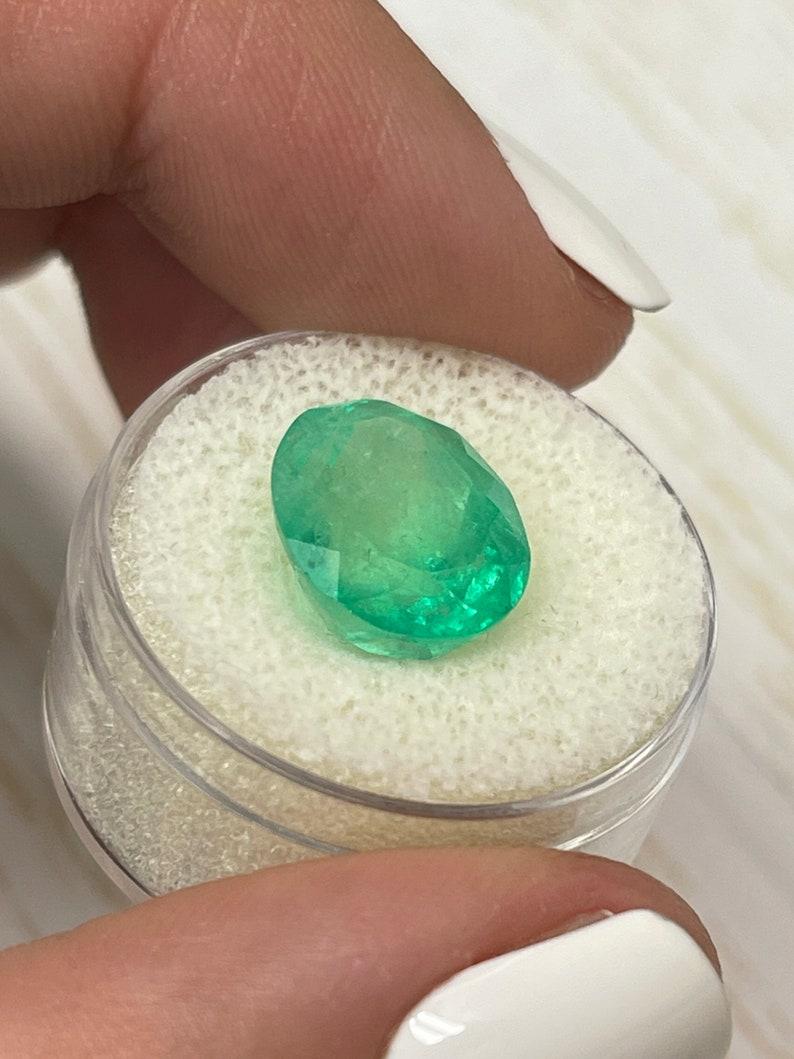 7.80 Carat Yellowish Green Colombian Emerald Oval Cut - May Birthstone Gem For Sale 1