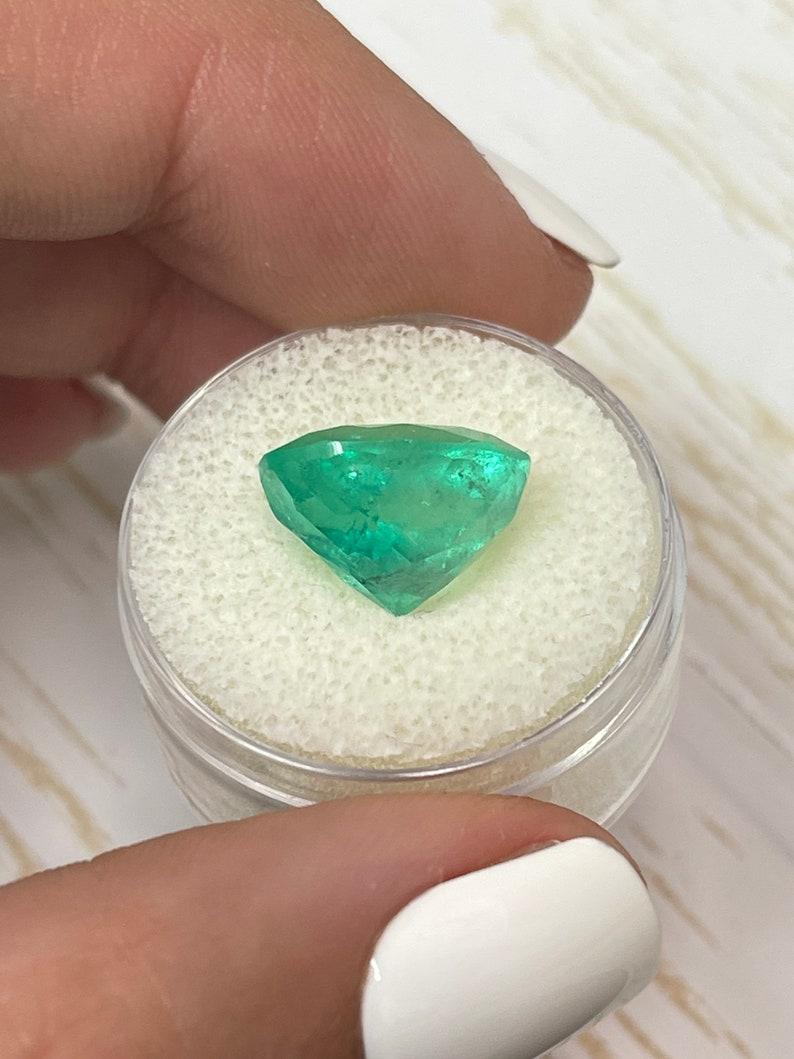7.80 Carat Yellowish Green Colombian Emerald Oval Cut - May Birthstone Gem For Sale 2