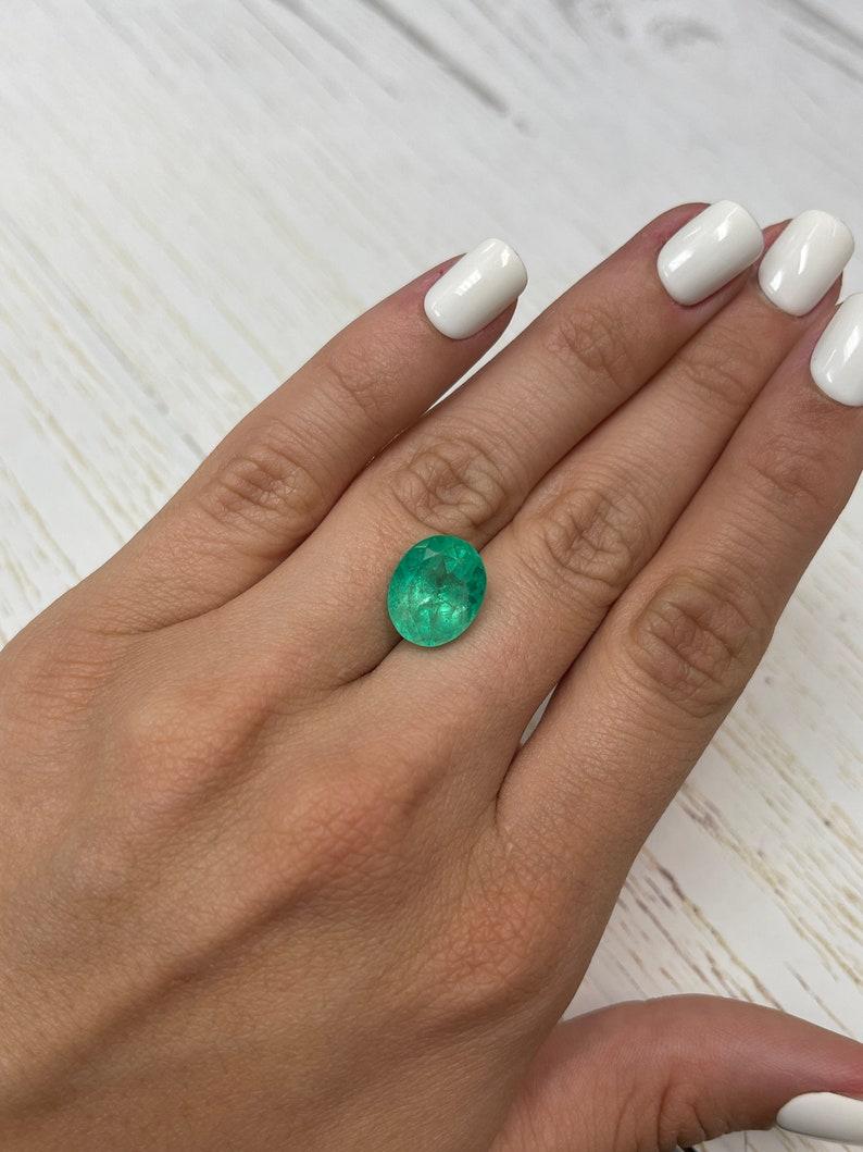 7.80 Carat Yellowish Green Colombian Emerald Oval Cut - May Birthstone Gem For Sale 3