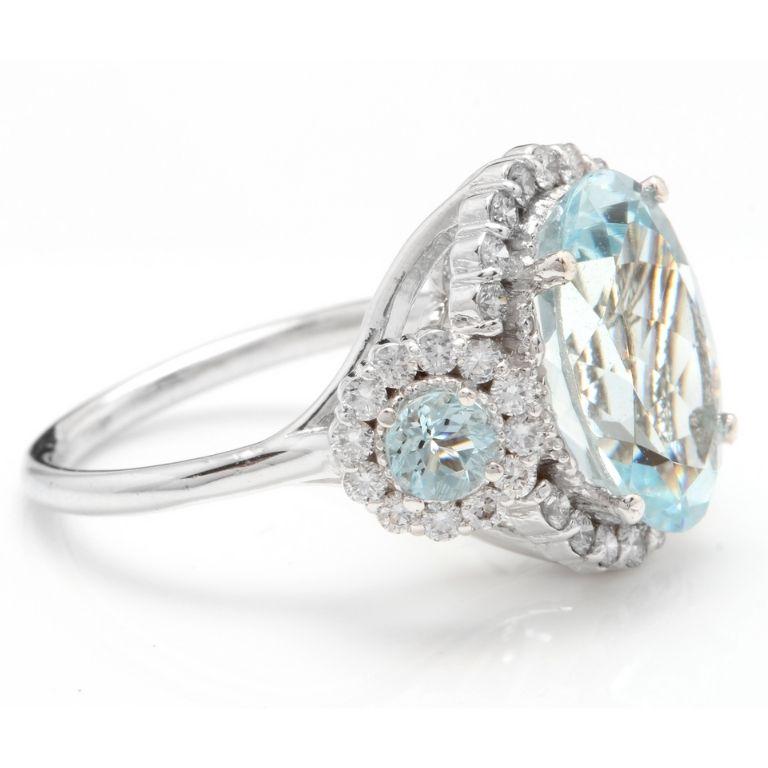 Exquisito anillo de oro blanco macizo de 14 quilates con aguamarina natural y diamantes de 7,80 quilates

El peso total de la aguamarina es Aprox. 7.00 Quilates

Medidas de la aguamarina: Aprox. 14.00 x 10.00mm

Tratamiento de la aguamarina: