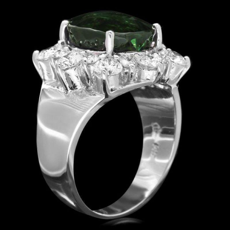 7.80 Carats Natural Green Tourmaline and Diamond 14K Solid White Gold Ring

Total Natural Tourmaline Weight is: Approx. 6.30 Carats 

Tourmaline Measures: Approx. 11.00 x 9.00mm

Natural Round Diamonds Weight:  1.50 Carats (color G-H / Clarity