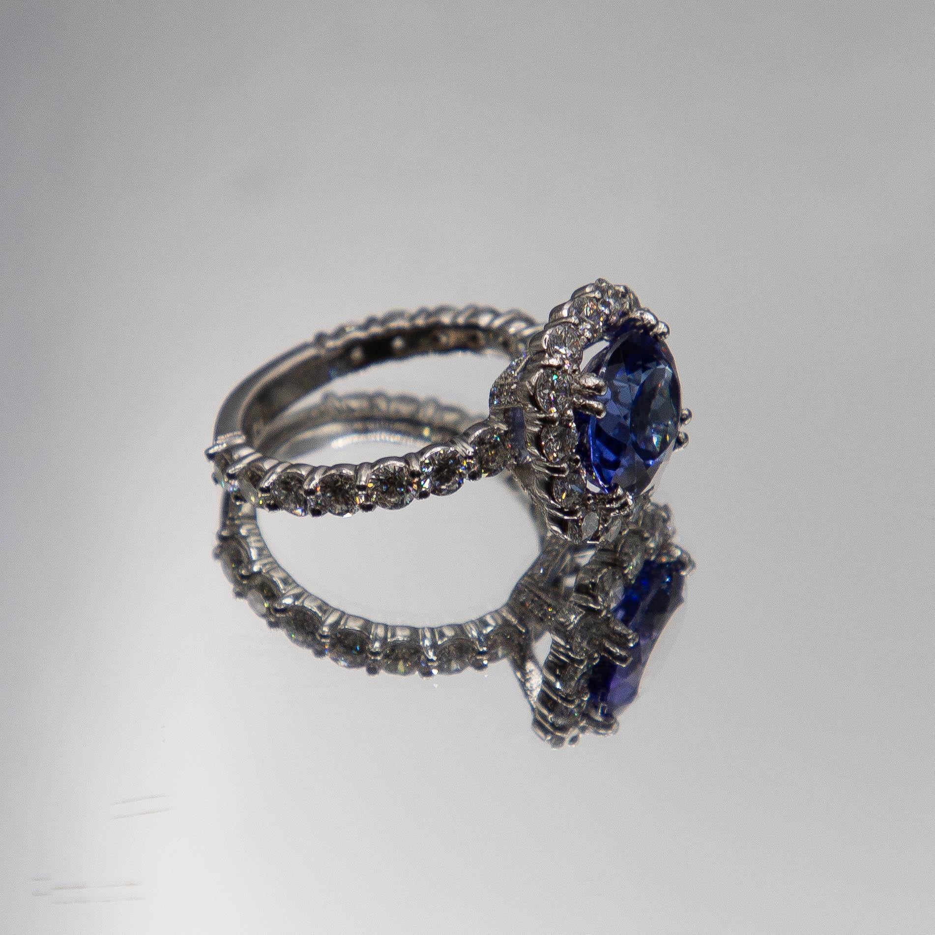 Oval Cut 7.80 carats total Ceylon oval sapphire and diamond 950 Platinum Diamond Ring For Sale