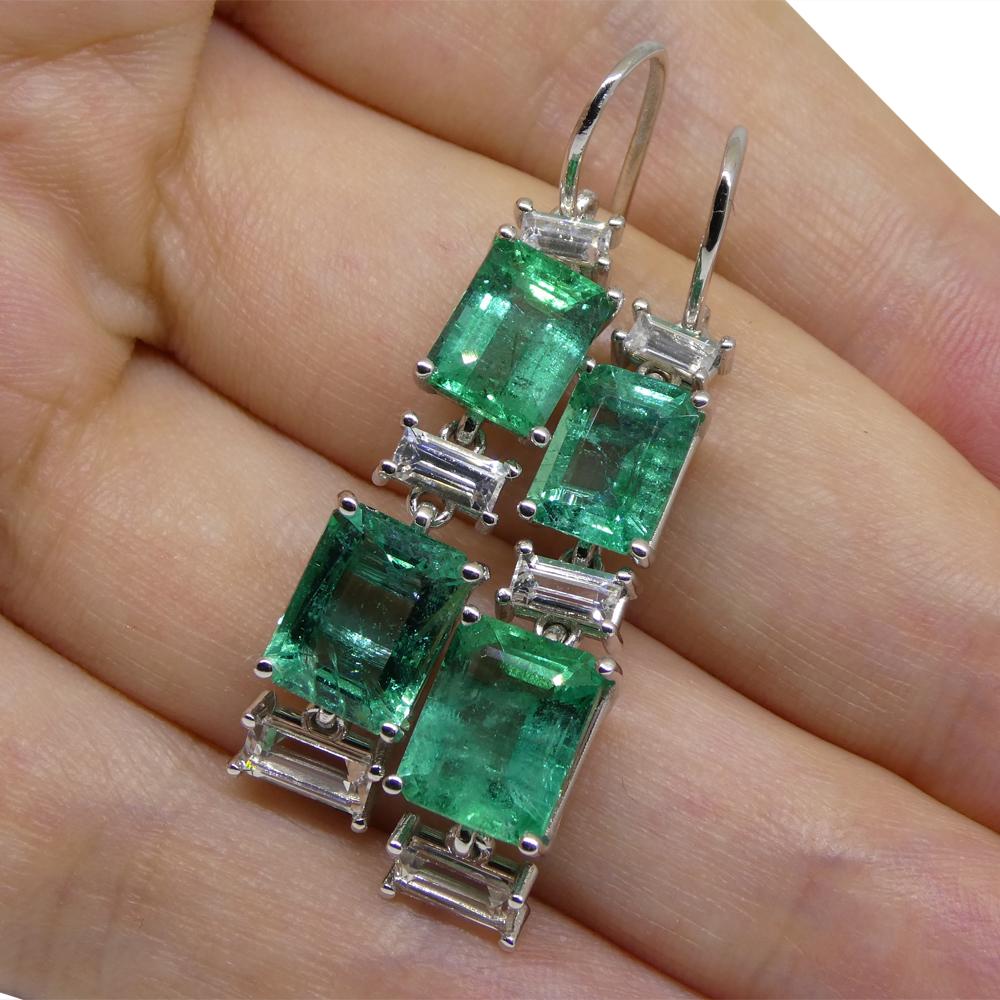 These are four beautiful emeralds, set with 1.80cts of white sapphire in gorgeous custom made 14k White Gold settings.   
These are made in Canada, and are incredibly fine quality! 
    
Description: 
Gem Type: Emerald  
Number of Stones: 4 