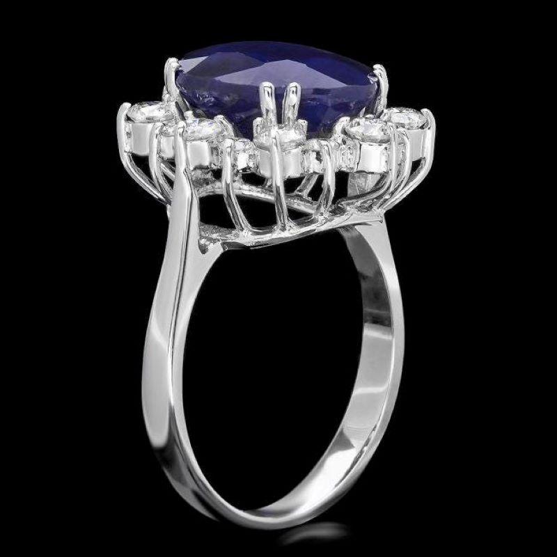 7.80 Carats Natural Blue Sapphire and Diamond 14K Solid White Gold Ring

Total Blue Sapphire Weight is: Approx. 6.90 Carats 

Sapphire Measures: Approx. 12.00 x 10.00mm

Natural Round Diamonds Weight: Approx. 0.90 Carats (color G-H / Clarity