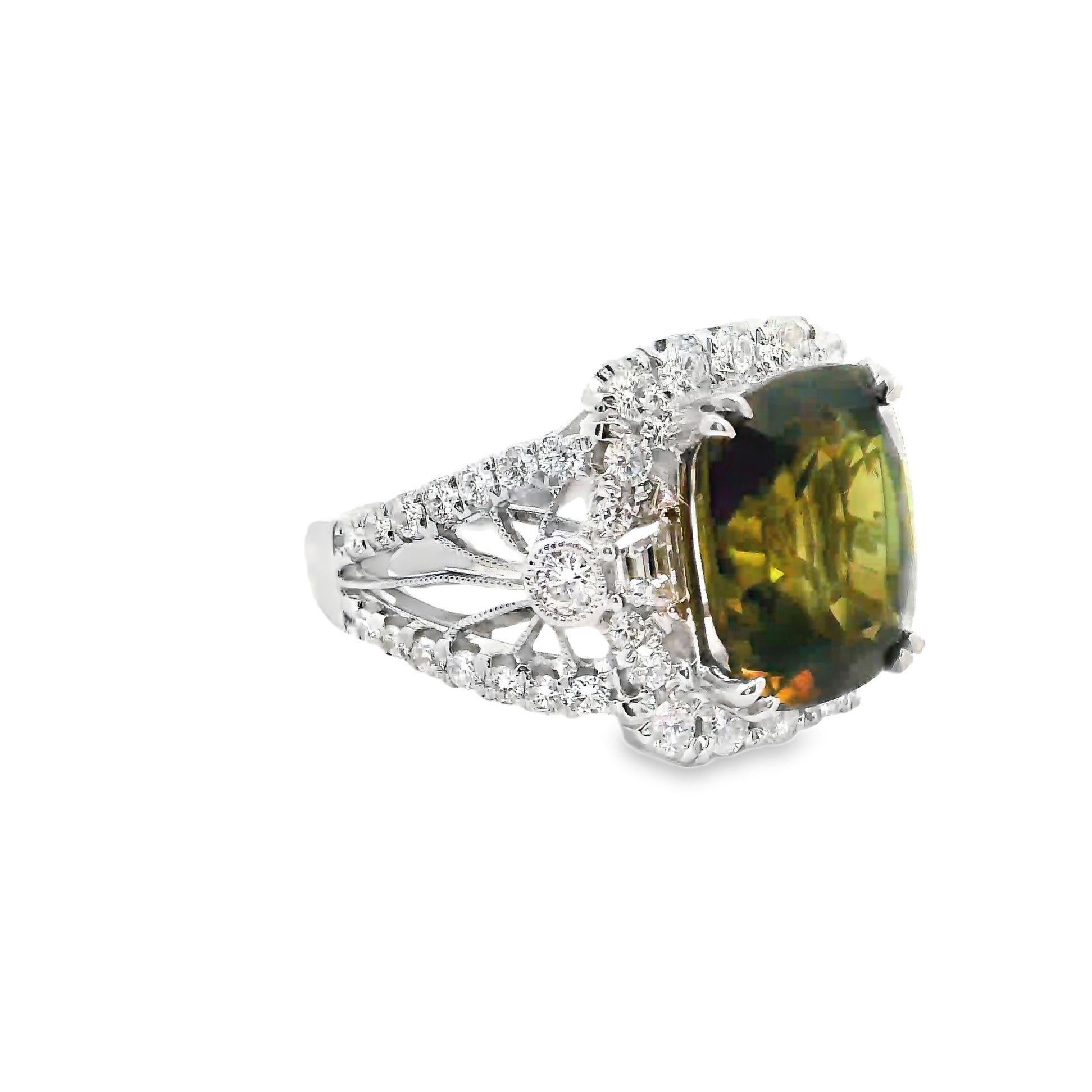 A very rare and impressive gemstone, alexandrite, weighing close to 8 carats! The gem has a rich vibrant body color that changes in different light sources. Under a white light it shows more green and yellow, while under a yellow (incandescent)