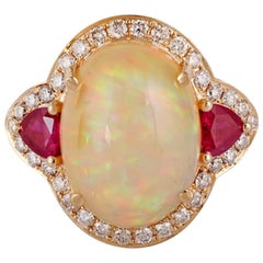 7.81 Carat Opal Ruby and Diamond Ring Studded in 18 Karat Yellow Gold