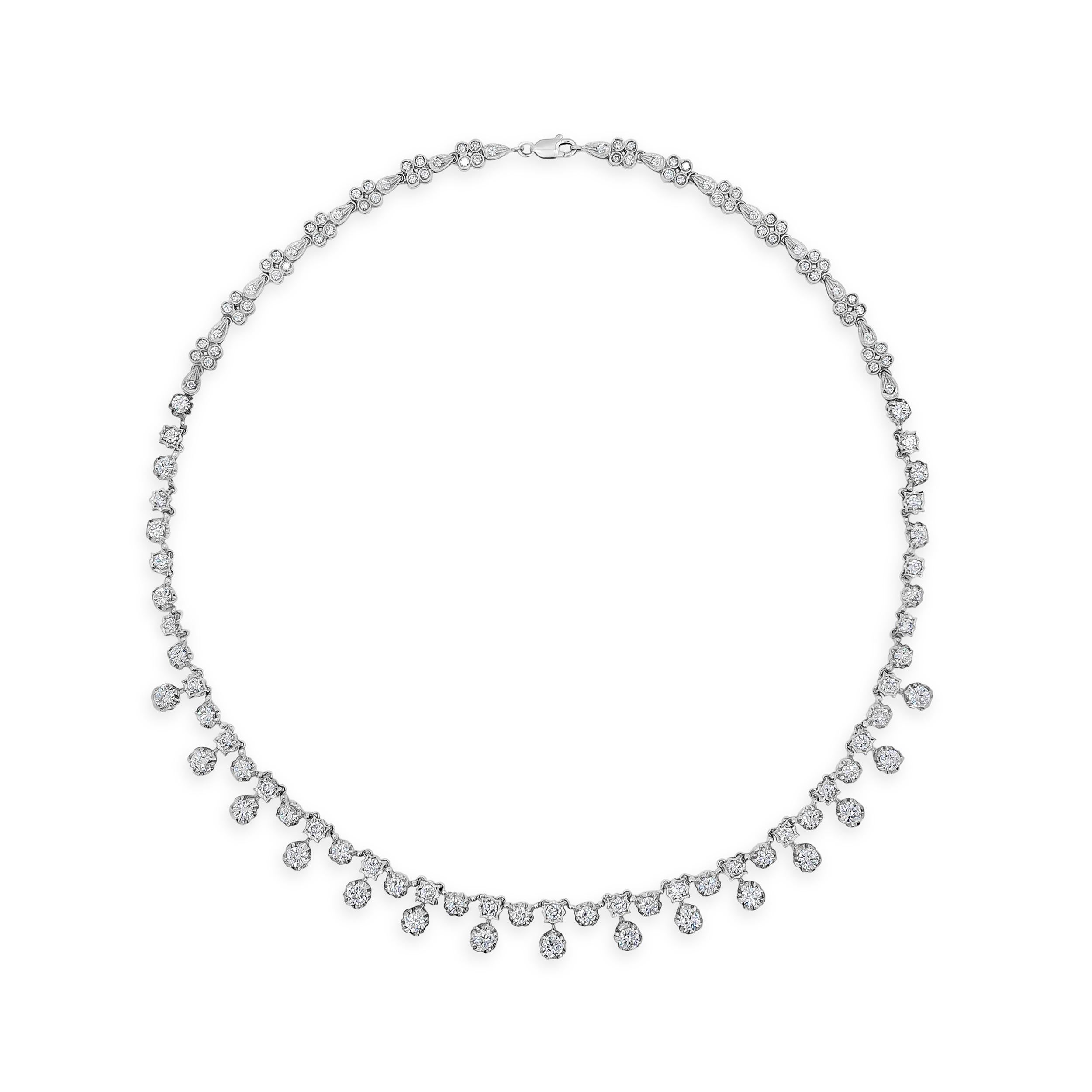 A modern and chic necklace style showcasing round brilliant diamonds weighing 7.81 carats total; Set in a starburst-like setting made in 18 karat white gold. A very brilliant piece of jewelry. 16 inches in length. 

Roman Malakov is a custom house,