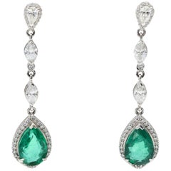 7.81 Carat Emerald Earrings in White Gold with .40 Carat of Diamonds