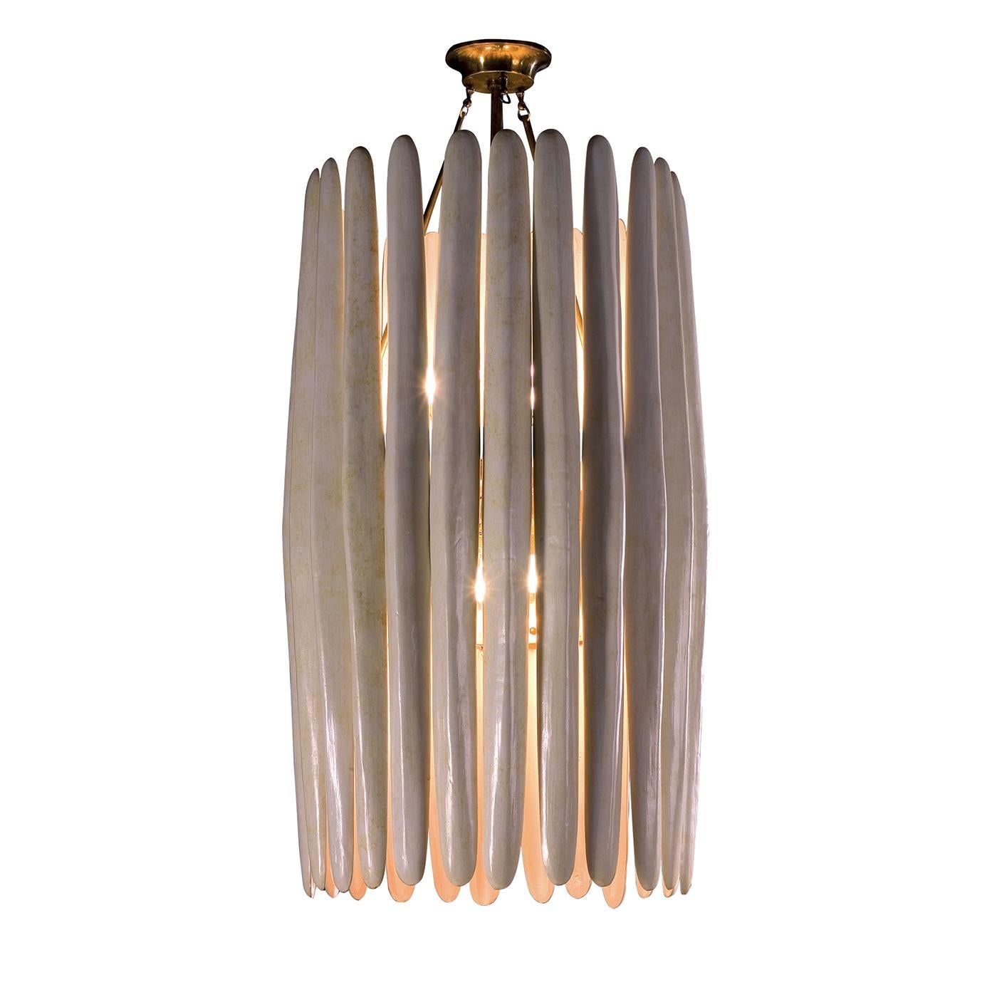 This chandelier is a work of true hand-craftsmanship of very high-quality. The cylindrical shade surrounding the illuminating element of this piece was crafted using a series of connecting elongated majolica elements, crafted by hand and glazed in